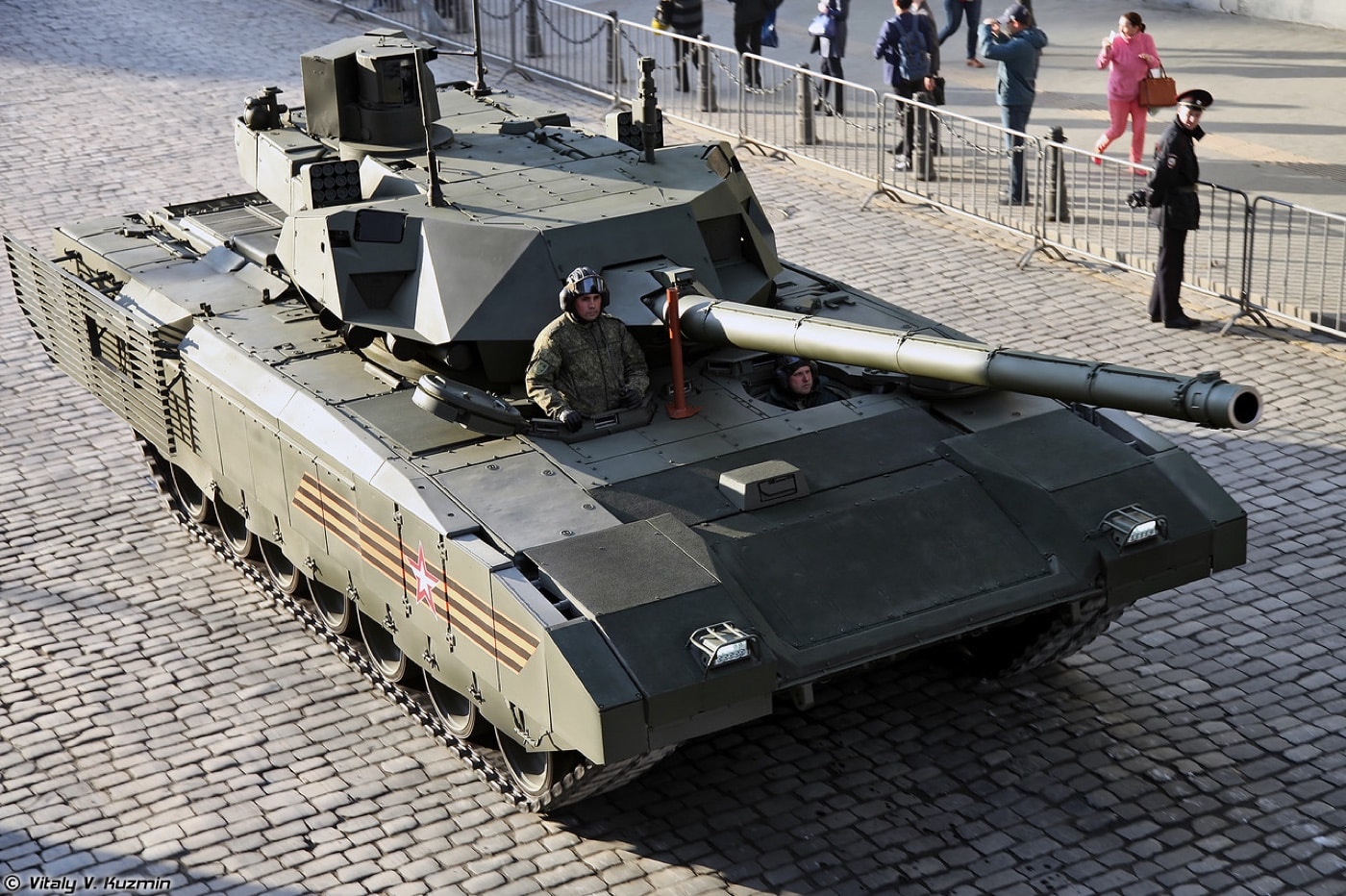 As seen in this photo, the T-14 Armata is a main battle tank designed for armored warfare. Part of its armament includes a main cannon that fires armor piercing ammunition in the form of a armour-piercing discarding sabot. Armour-piercing discarding sabot is a type of spin-stabilized kinetic energy projectile for anti-armour warfare. Each projectile consists of a sub-calibre round fitted with a sabot.