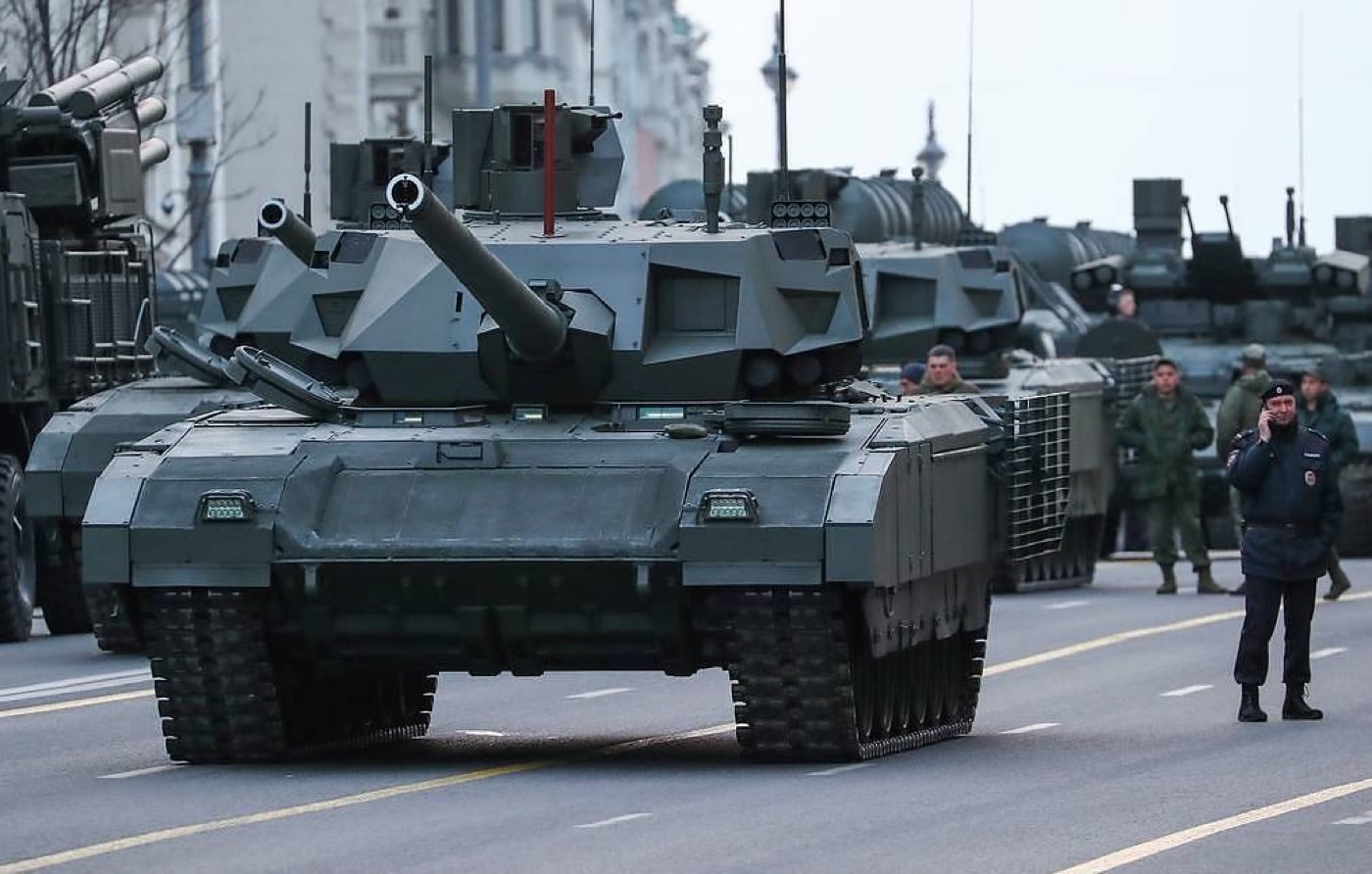 In this photograph, several T-14 tanks are lined up for a parade in Moscow. You can see the grid on the side of the tank that offers side protection from anti-tank ammunition. Unveiled in 2015, the tanks also offer an active protection system to defend against an armor-piercing fin-stabilized discarding sabot. The front of the hull is reinforced and sloped for added defense. 