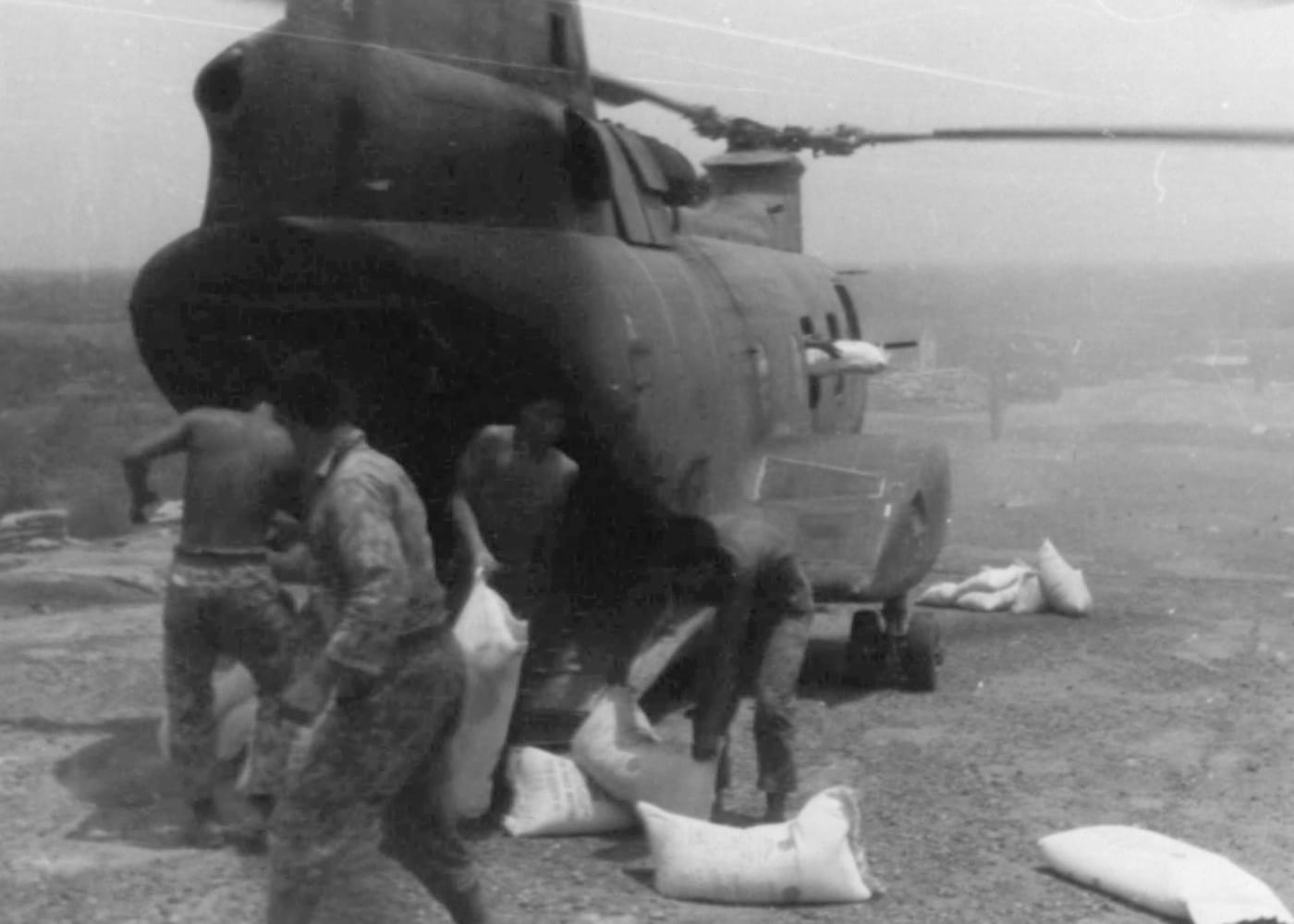 In this photo, ROK Marines unload a Boeing Vertol CH-46 Sea Knight helicopter from the United States Marine Corps that delivered supplies like food, rice, ammunition, water, and medical supplies. Things like first aid kits, bullets, mines and grenades were needed to fight North Korean soldier infiltrators attempting to overthrow the legitimate government of South Vietnam.