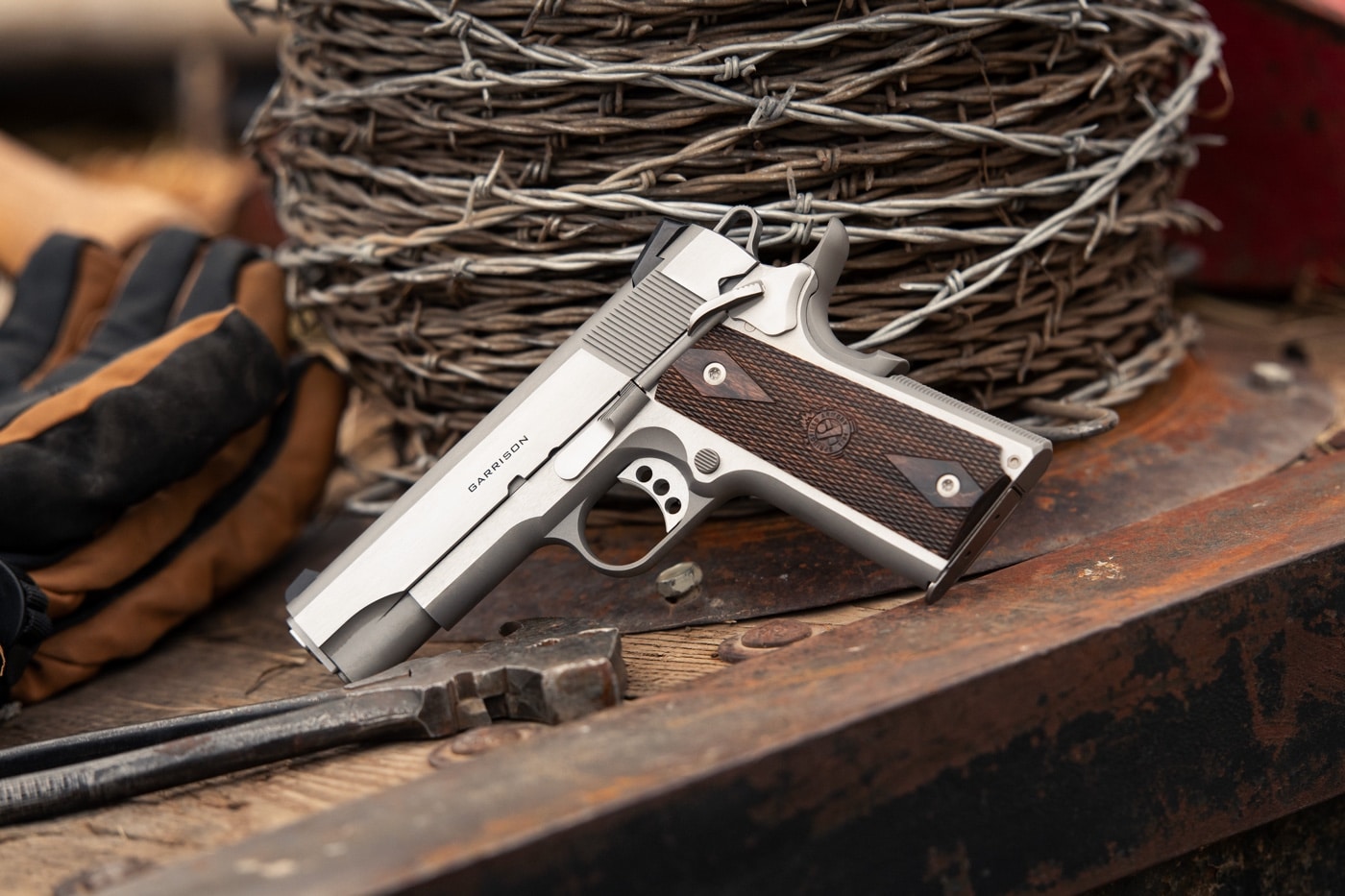 In this digital image, we see the Springfield Armory 1911 Garrison 4.25-inch pistol chambered in .45 ACP. The .45 ACP, also known as .45 Auto, .45 Automatic, or 11.43×23mm is a rimless straight-walled handgun cartridge designed by John Moses Browning in 1904, for use in his prototype Colt semi-automatic pistol.