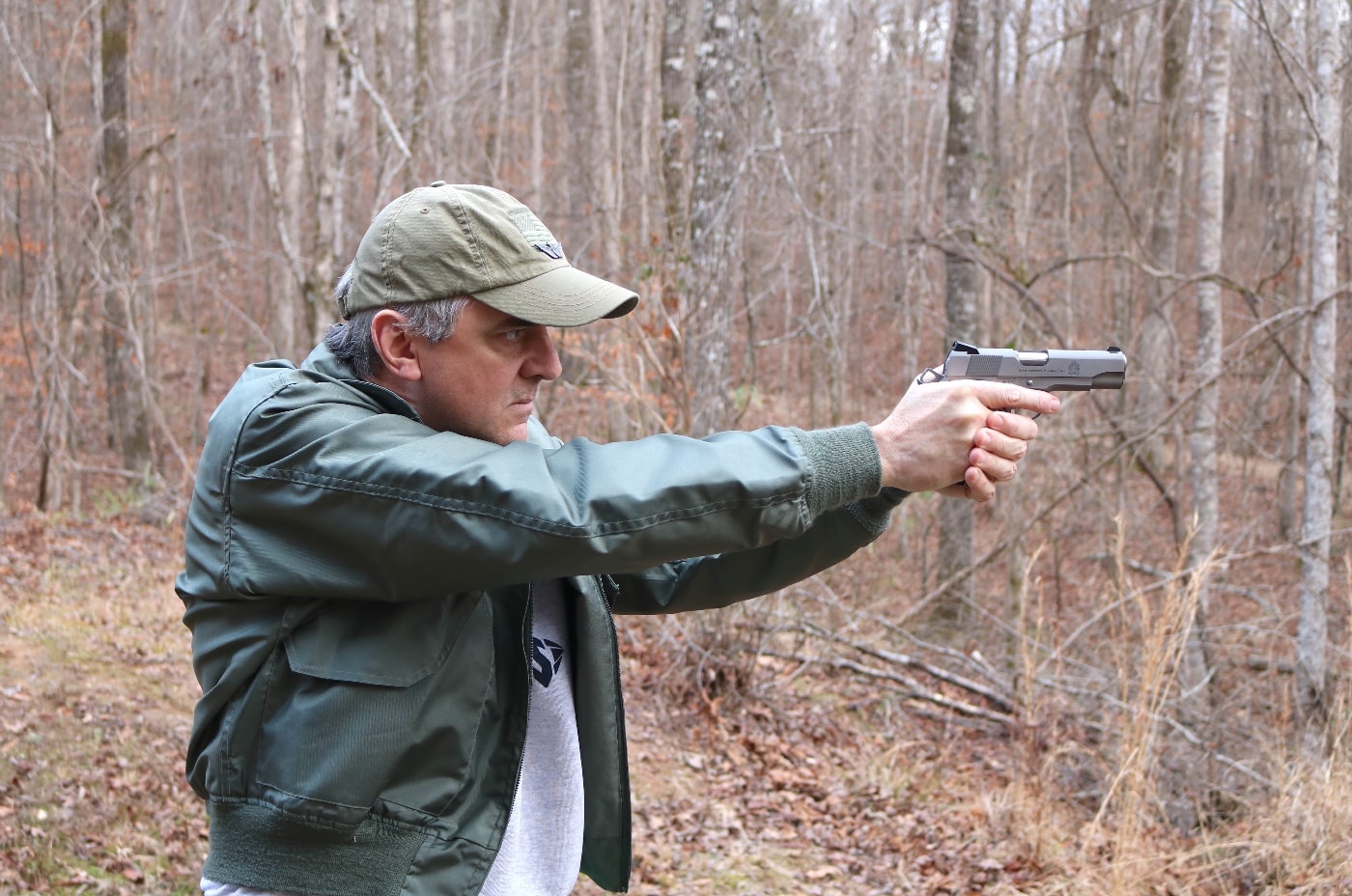 In this photo, the author is shooting the Springfield Armory 1911 Garrison 4.25" model. The semi-automatic firearm is an excellent choice for personal defense when outside of the home.