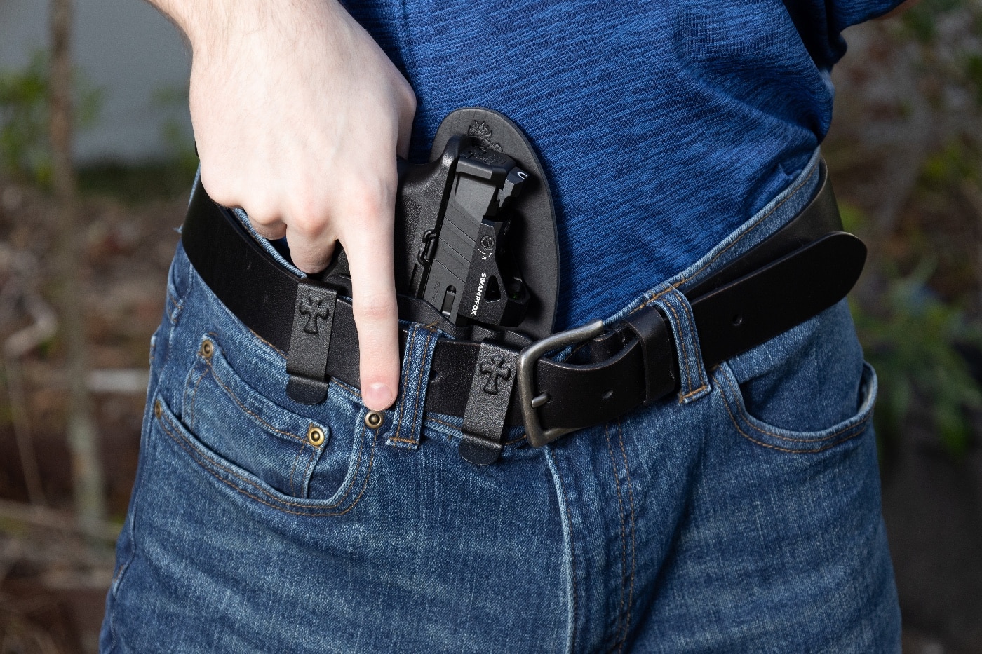 In this photo, we see the author carrying Echelon in the IWB position.  Inside-the-waistband holsters, a category of handgun holster, provides ready access to the gun in concealed carry.