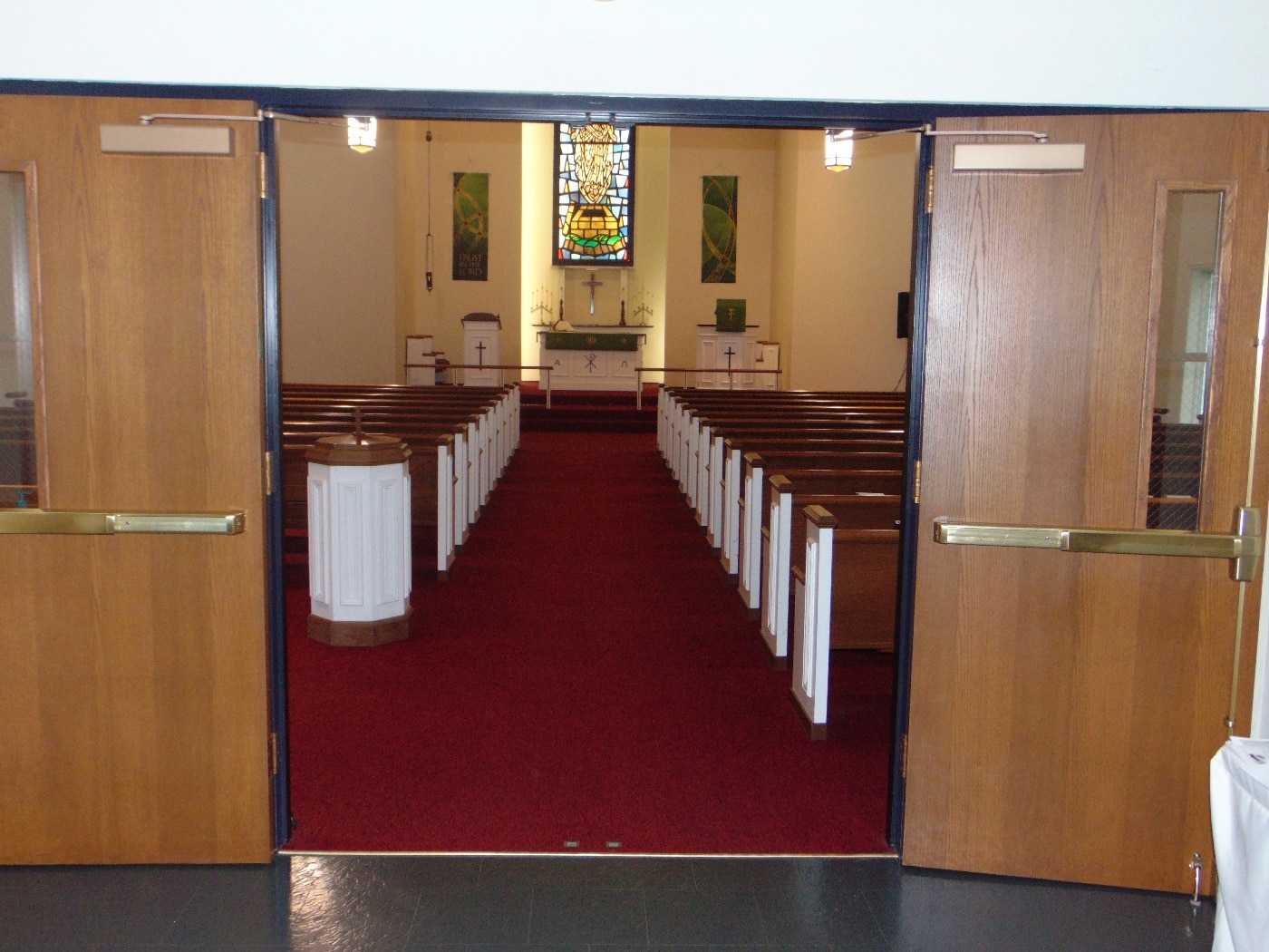 This is a digital image of the interior of a Roman Catholic church with the sanctuary, altar and pews all visible. Attacks have been made against Catholic churches in addition to Protestant churches and Jewish synagogues.