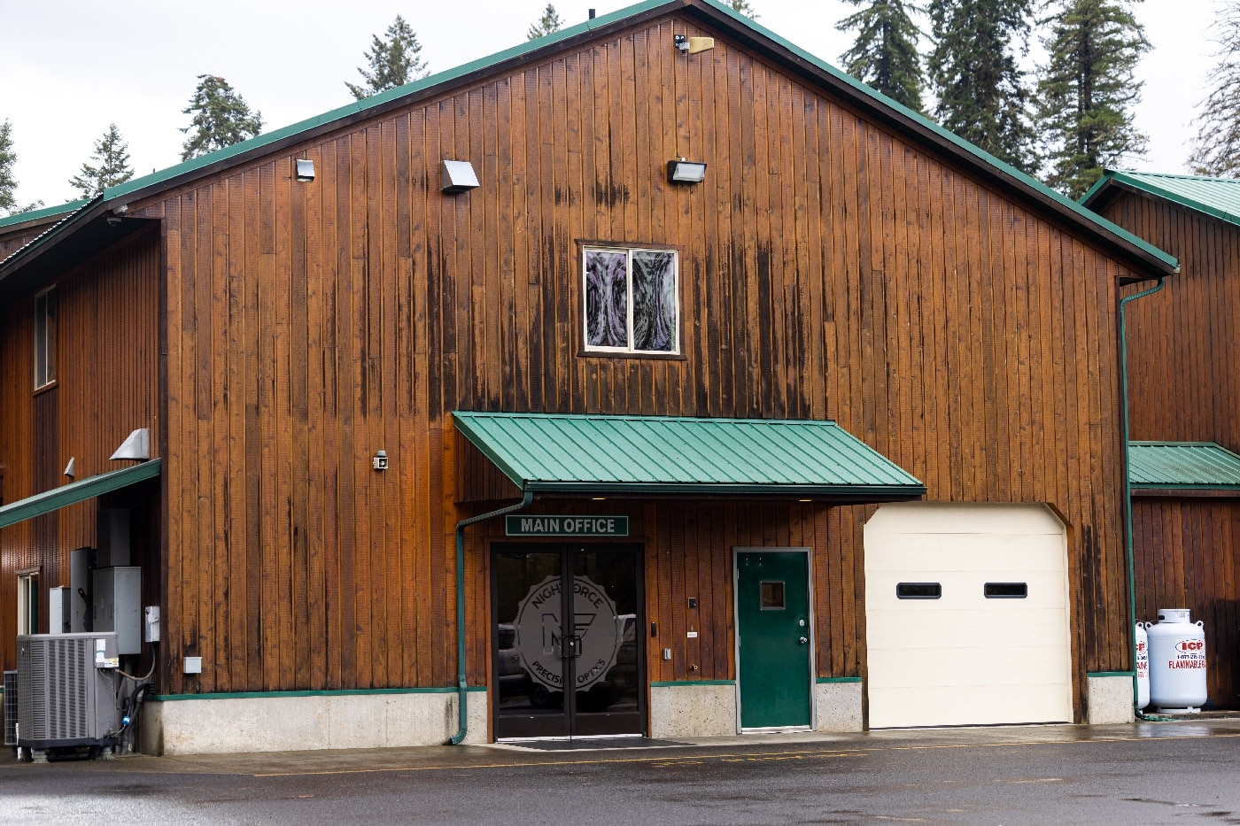 In this digital photo, we see the entrance to Nightforce Optics main office. Through these doors you enter the machine shop and assembly plant for the rifle scopes.