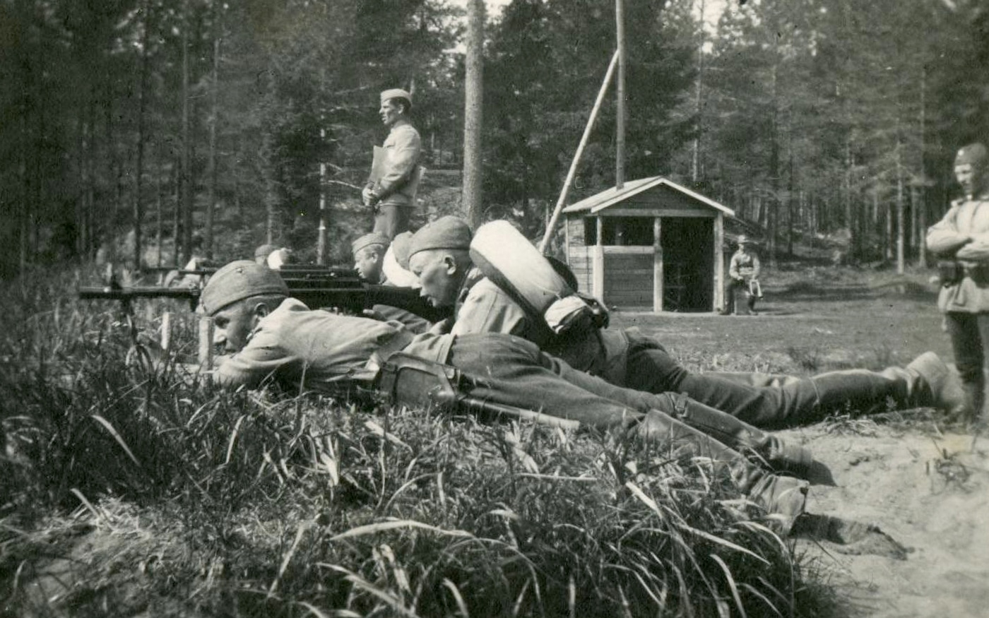 This is a photo of Finnish soldiers firing M/26 light machine guns near Nurmijärvi. Nurmijärvi is a rural municipality north of Helsinki, the capital of Finland. 