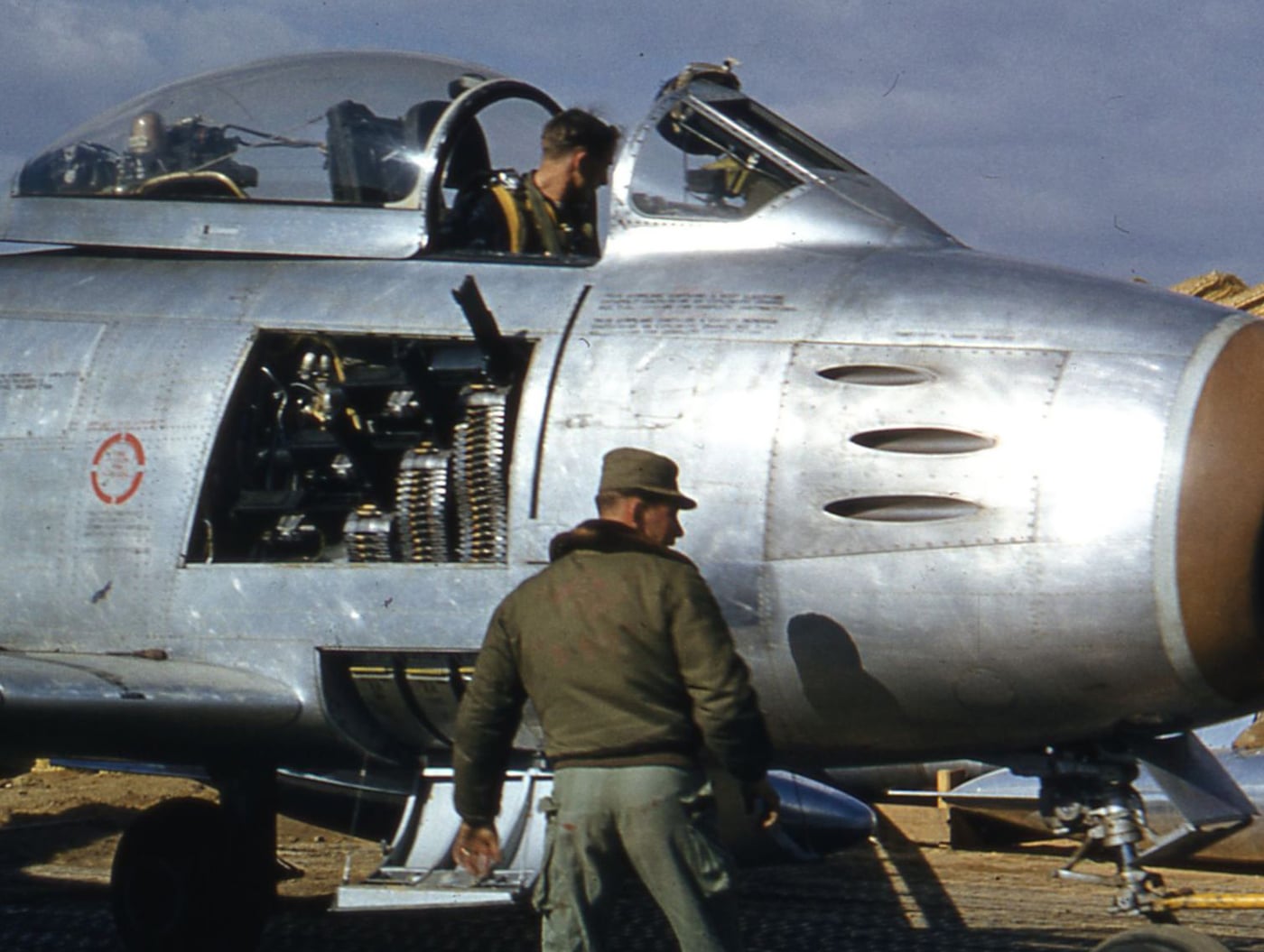 In this photo, three of the six Browning .50-caliber machine guns can be seen along with their electronically boosted feeding mechanisms. These guns has a 1,300 rounds per minute rate of fire and were regulated at a distance of 1,000 feet. Most Sabre variants had sixz of these guns, but some had only four. 