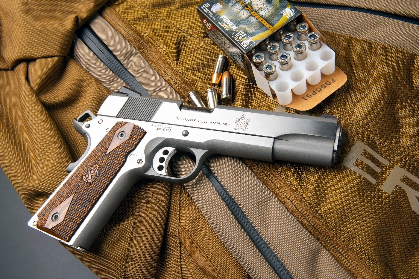 This photo shows a Springfield Armory 9mm 1911 handgun with Federal Ammunition 124-grain hollow point bullets. The load has proved to be accurate and effective in defensive shootings.