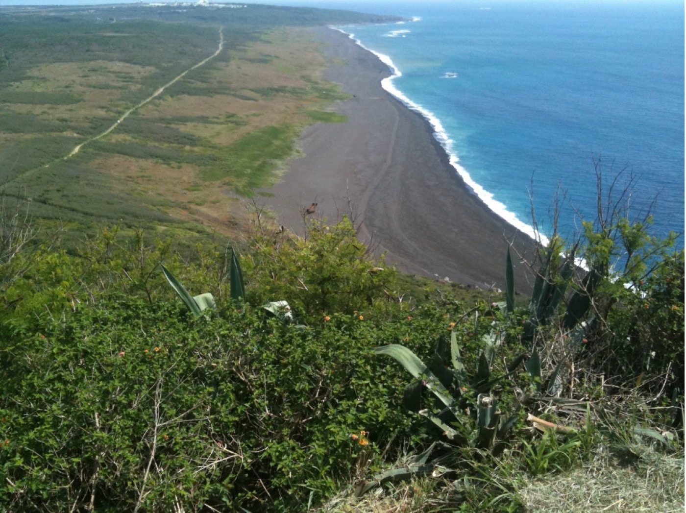 This is a modern day view of the invasion beaches from Mt. Suribachi on Iwo Jima. The United States Army Air Forces saw the island as being a good launching point for strategic bombing missions against the Empire of Japan. U.S. Navy Seabee construction battalions would later repair and upgrade the island's airports to support the US allies of World War II. After the attack on Pearl Harbor, the Imperial Japanese Navy fought a largely defensive battle until the war's end.