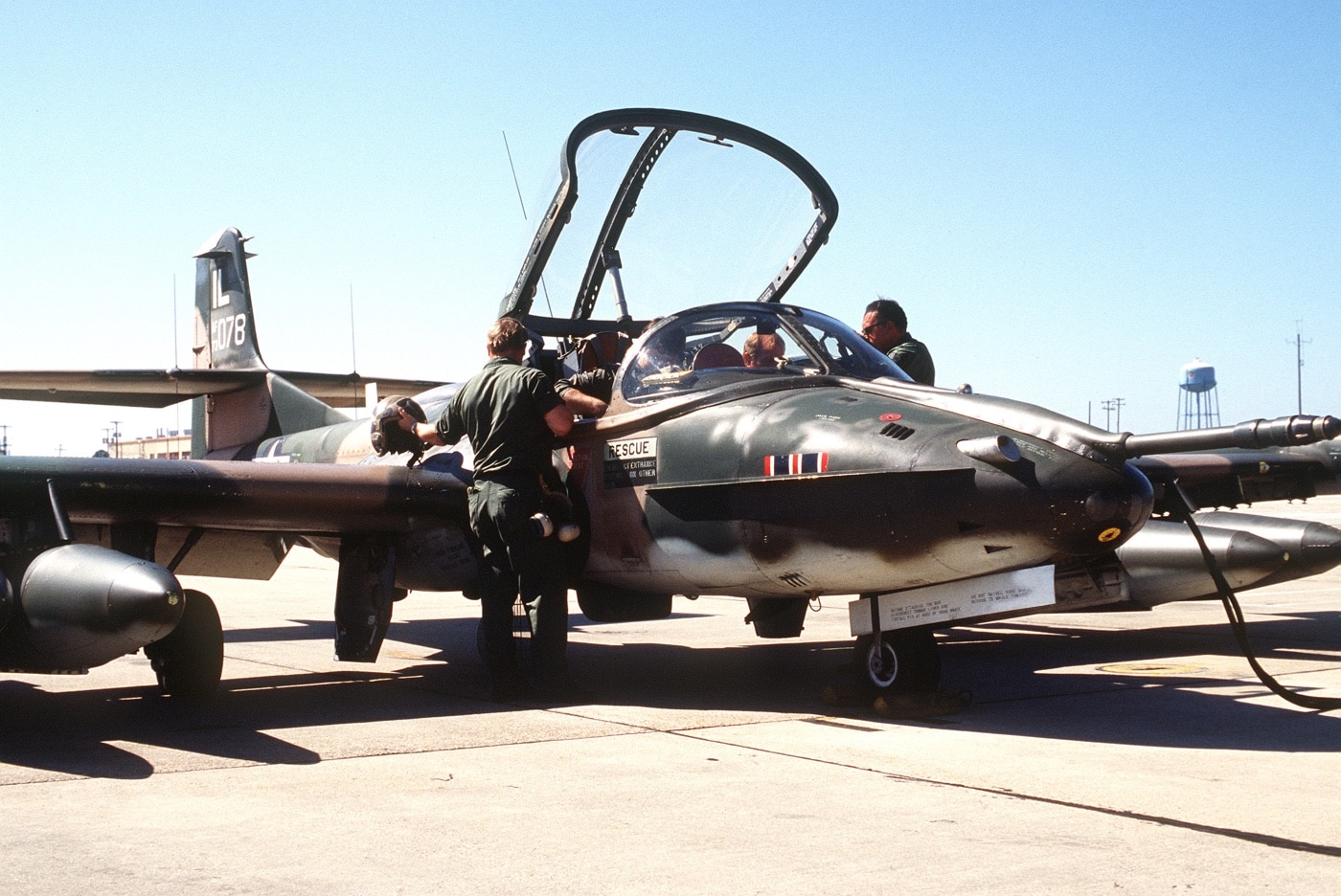 In this photograph we see airmen of the United States Air Force preparing A-37s for a simulated interdiction combat mission in 1982. The List of United States Air Force squadrons operating the A-37 Dragonfly is short. This is a list of A-37B Dragonfly squadrons of the United States Air Force. Cessna Aircraft built a total of 577 A-37B's. The aircraft was used for a relatively short period by the USAF; however, many aircraft had long service lives flying for the Air Force Reserves and Air National Guard.
