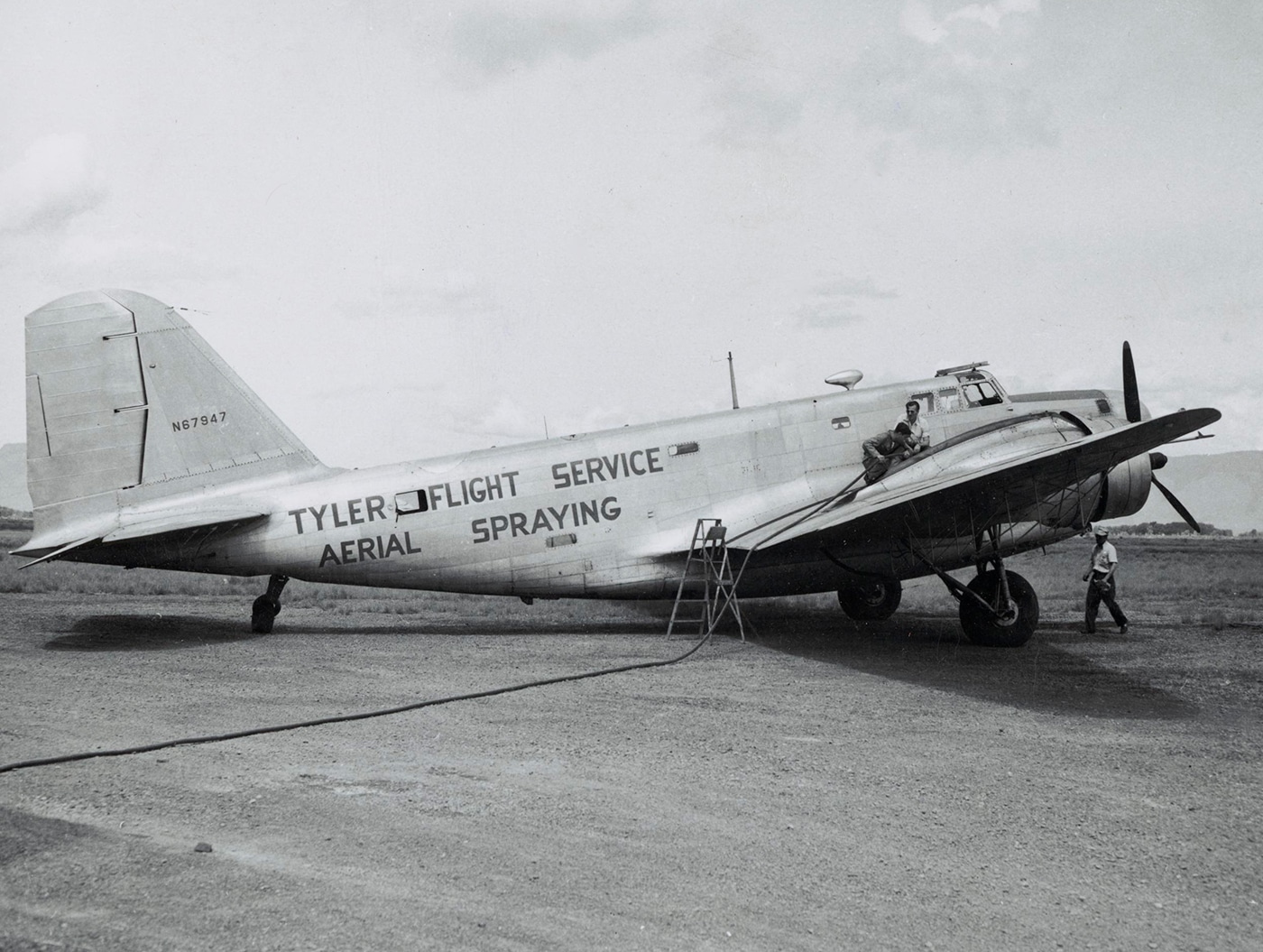 In this photograph, we see a post-WWII B-18 in civilian use. These planes were often used for cargo or crop spraying aircraft by commercial operators  — a much different position that its role in 1943. This one sprayed DDT. Dichlorodiphenyltrichloroethane, commonly known as DDT, is a colorless, tasteless, and almost odorless crystalline chemical compound, an organochloride. Originally developed as an insecticide, it became infamous for its environmental impacts. DDT was first synthesized in 1874 by the Austrian chemist Othmar Zeidler. DDT's insecticidal action was discovered by the Swiss chemist Paul Hermann Müller in 1939.