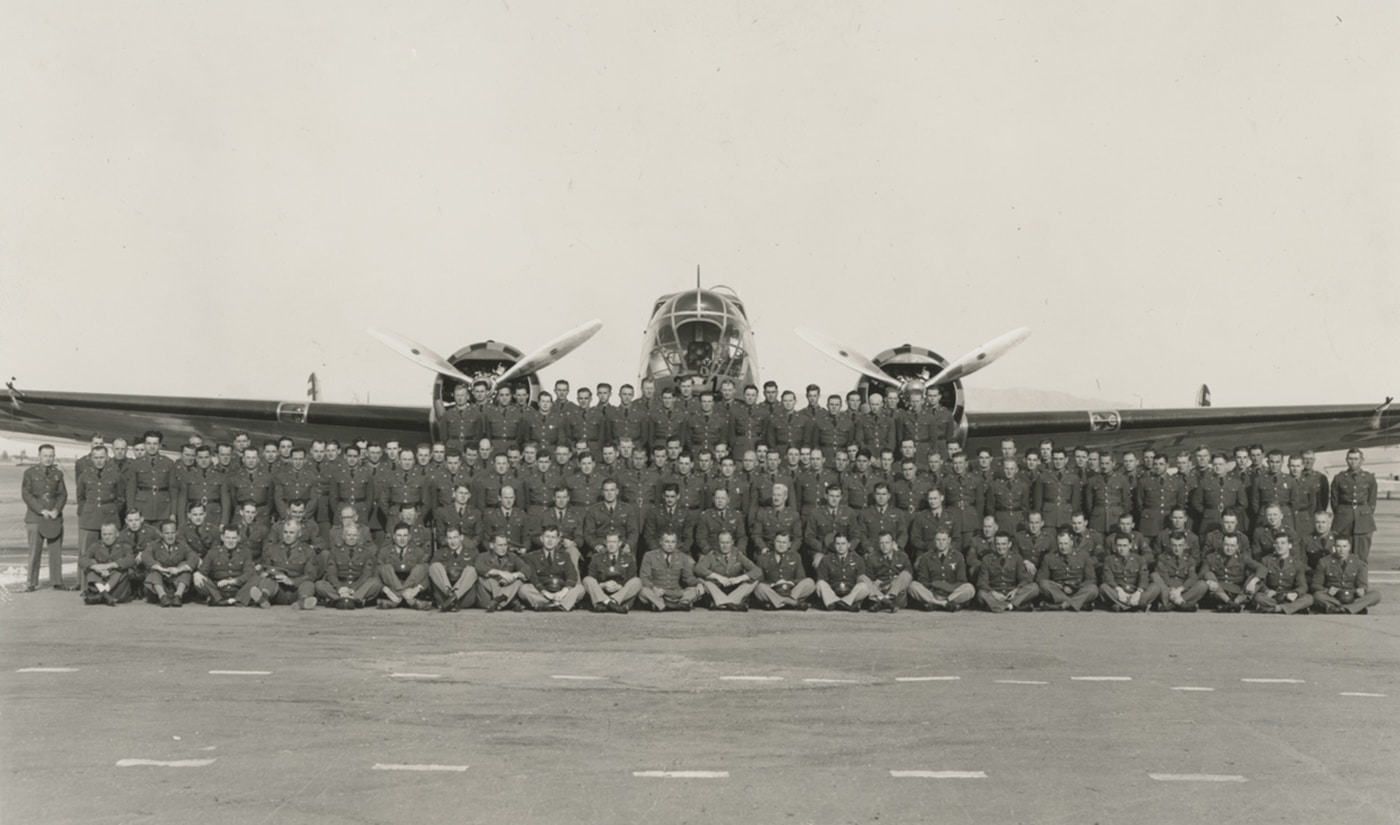 This unit photograph shows a squadron of B-18A pilots and crews. 