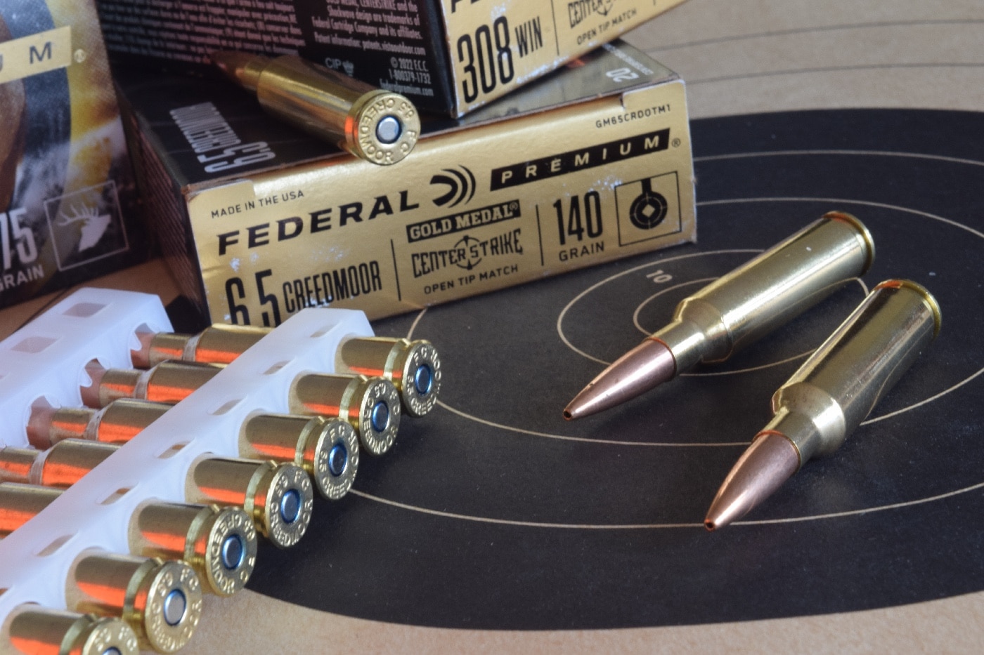In this photograph we see the author's target along with Federal Premium Ammunition loads for the .308 Winchester and 6.5mm Creedmoor. Both ammo loads would be good for whitetail deer hunting, mule deer or even hog hunts. A soft-point bullet, also known as a soft-nosed bullet, is a jacketed expanding bullet with a soft metal core enclosed by a stronger metal jacket left open at the forward tip. A hollow-point bullet is a type of expanding bullet which expands on impact with a soft target, transferring more or all of the projectile's energy into the target over a shorter distance.