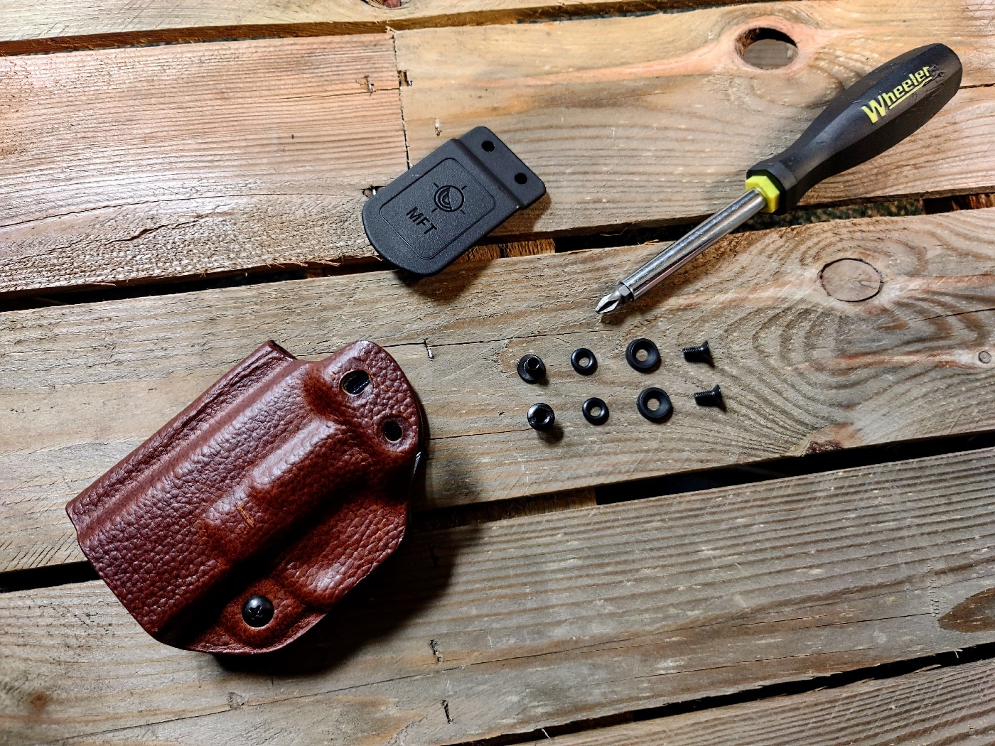 Shown here is the holster being adjusted by the author with a screwdriver. The Mission First Tactical holster can be adjusted by the user so that it can be used as OWB, AIWB or IWB - plus it can be used on the right or left side of the body.
