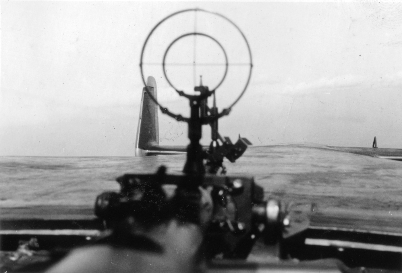 This photograph gives us a first person view of a MG15 sight in rear of Do17.