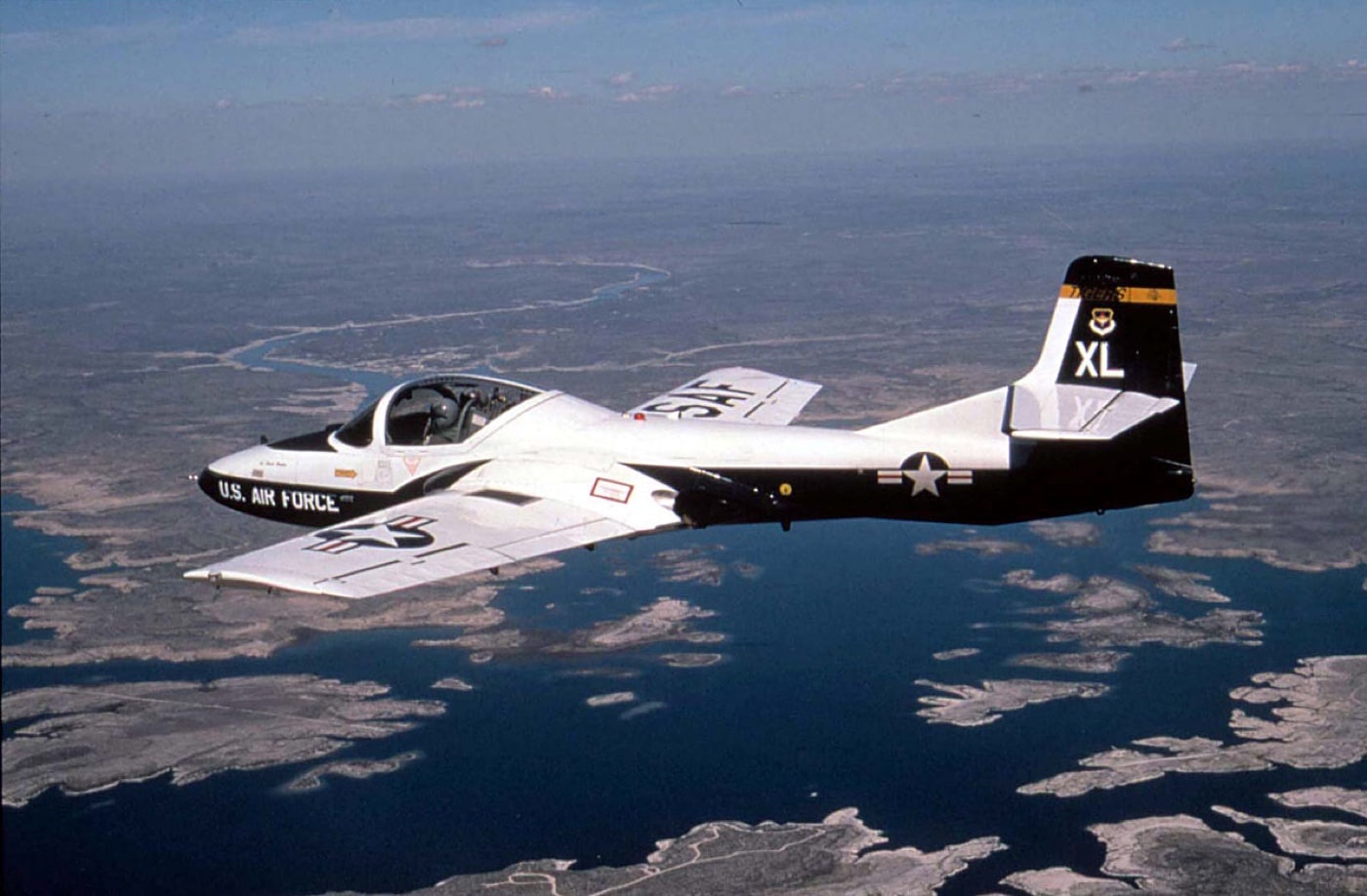 In this digital image, we see a T-37 trainer aircraft in flight over Texas. The Cessna T-37 Tweet is a small, economical twin-engined jet trainer aircraft. It was flown for decades as a primary trainer of the United States Air Force as well as in the air forces of several other nations.