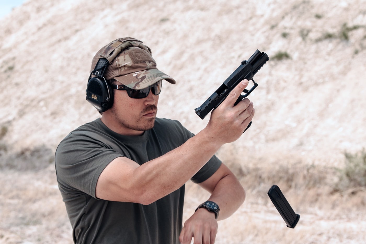 In this digital photo, we see the shooter reloading a Springfield Armory Echelon 9mm pistol.