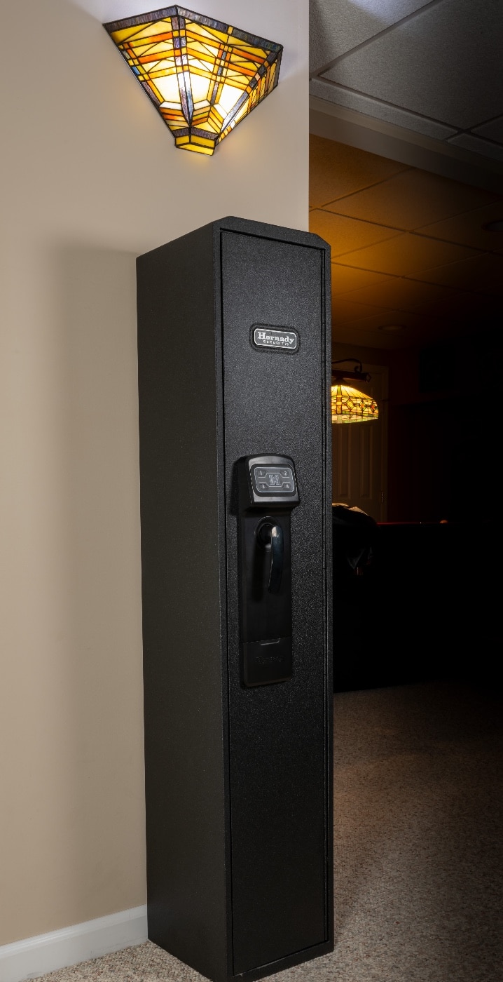 Shown in this photograph is the Hornady RAPiD Safe Ready Vault with a closed door inside the author's home. 