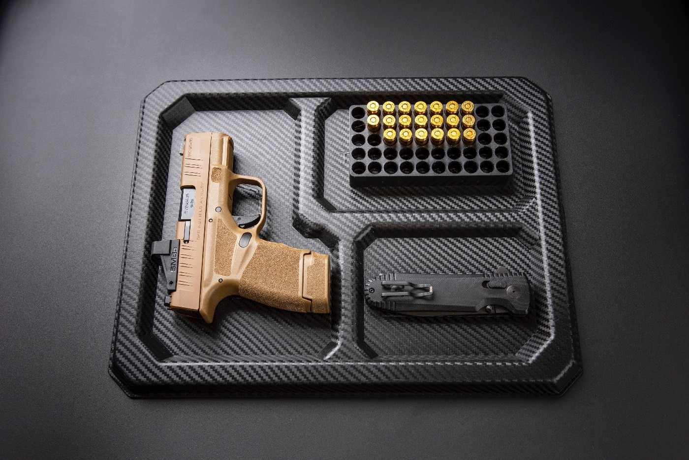 tray with Springfield Hellcat and ammo