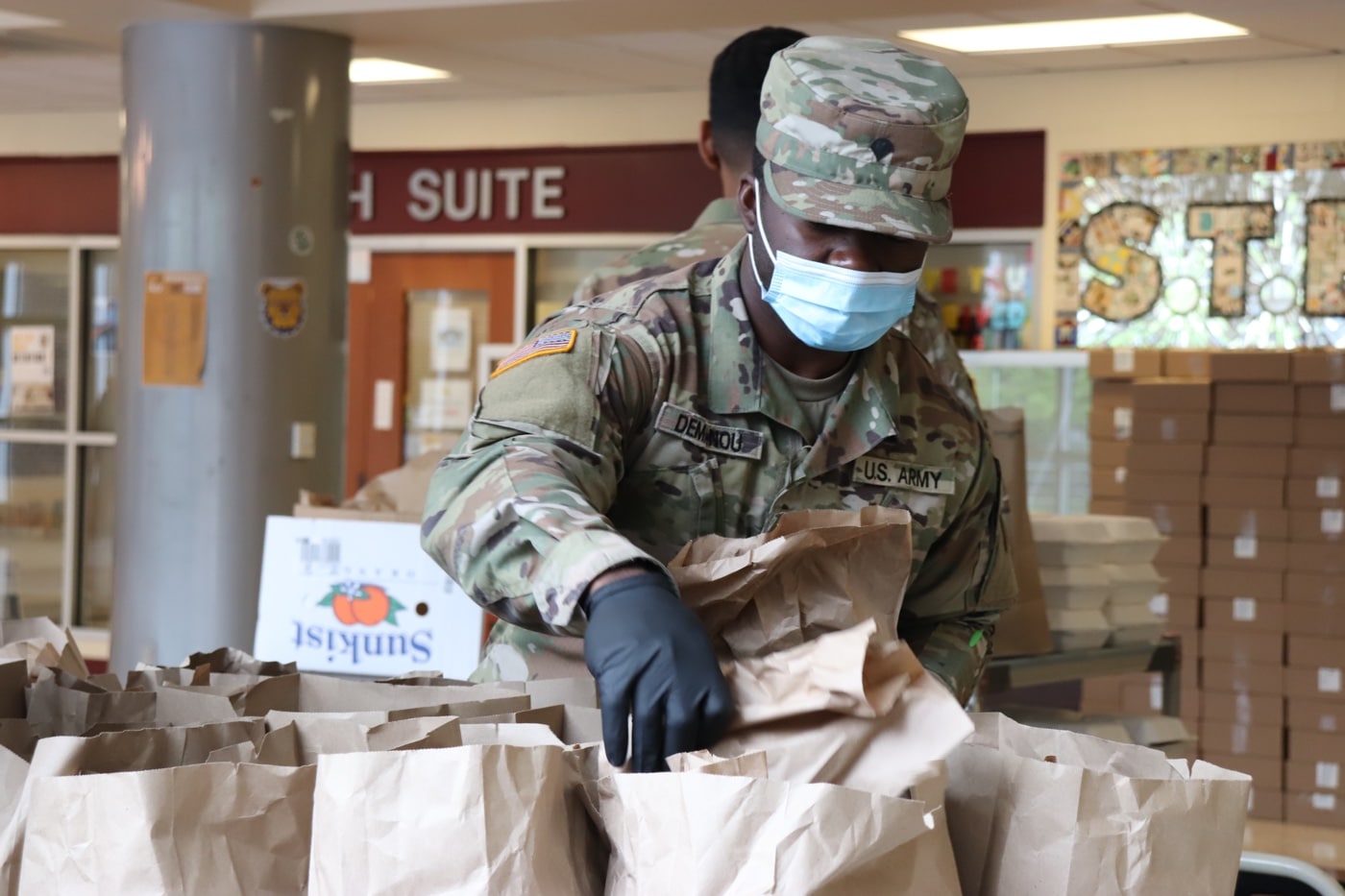 MD National Guardsman prepares food for delivery during COVID-19 pandemic