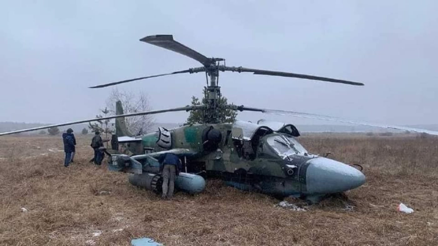 In this photo we see a Russian helicopter that was shot down by Ukrainian soldiers. The Ka-52 is a two-seat version of the Ka-50 Black Shark helicopter. It uses a coaxial rotor system and uses an ejection system for the pilots.