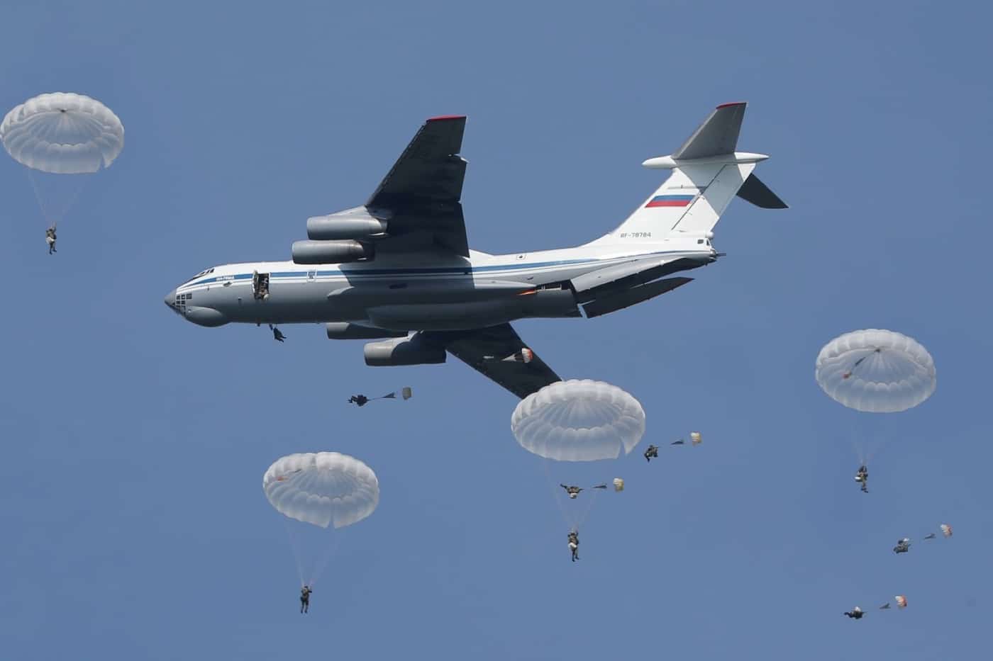 Russian paratroopers jumping out of a transport plane