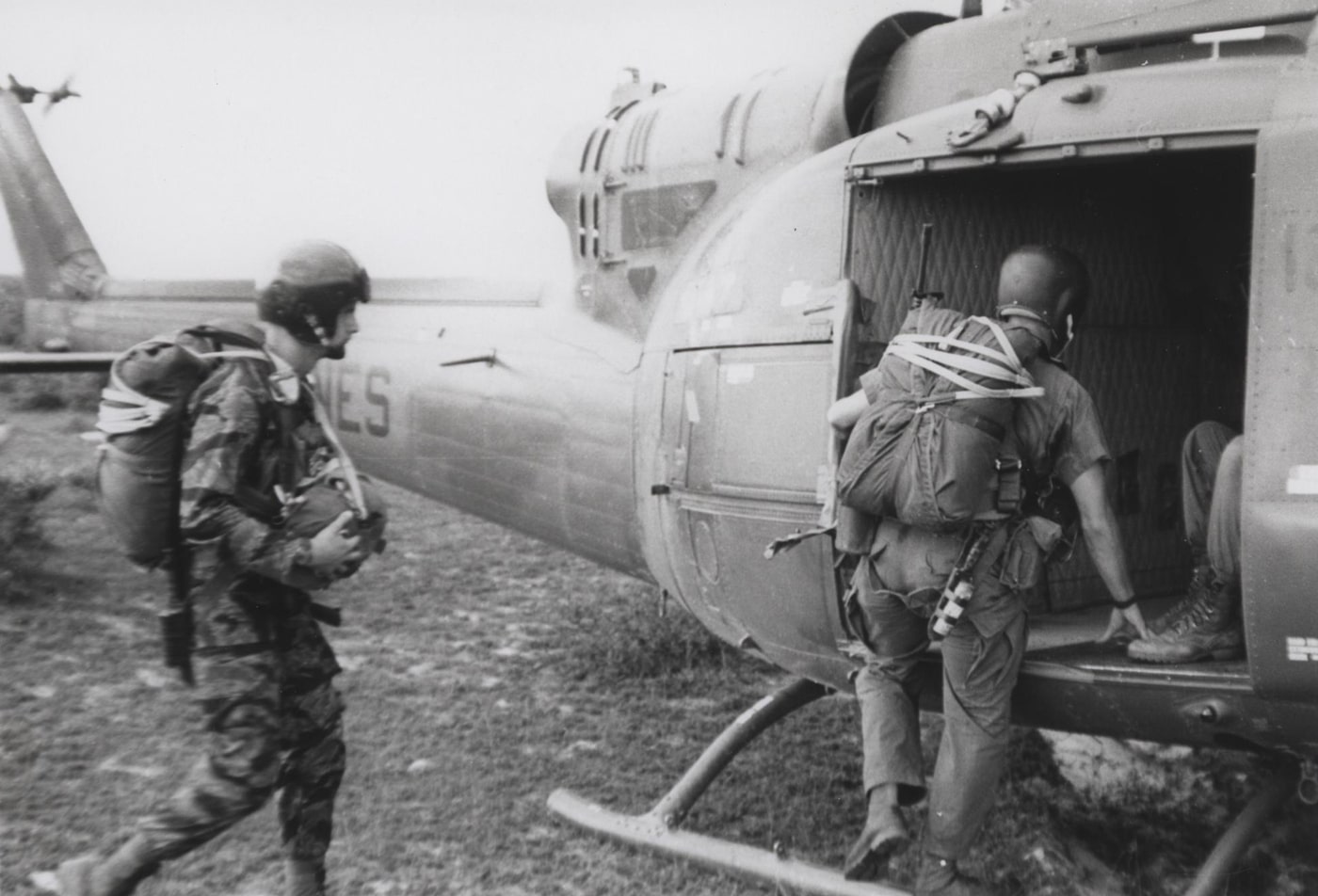 In this photo, we see U.S. Marines of 3rd Force Reconnaissance Company (3rd Force Recon) climb aboard a UH-1E for a paradrop during the Vietnam War. Image: Sgt. J.G. McCullough/U.S.M.C.