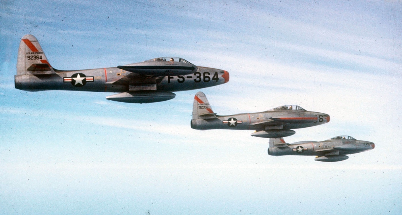 flight of three F-84 fighters over Korea