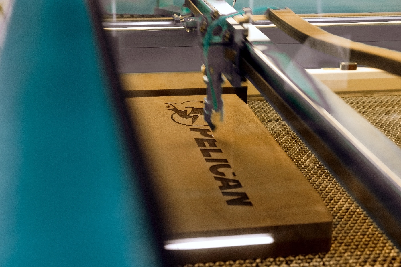 laser engraving the Pelican logo