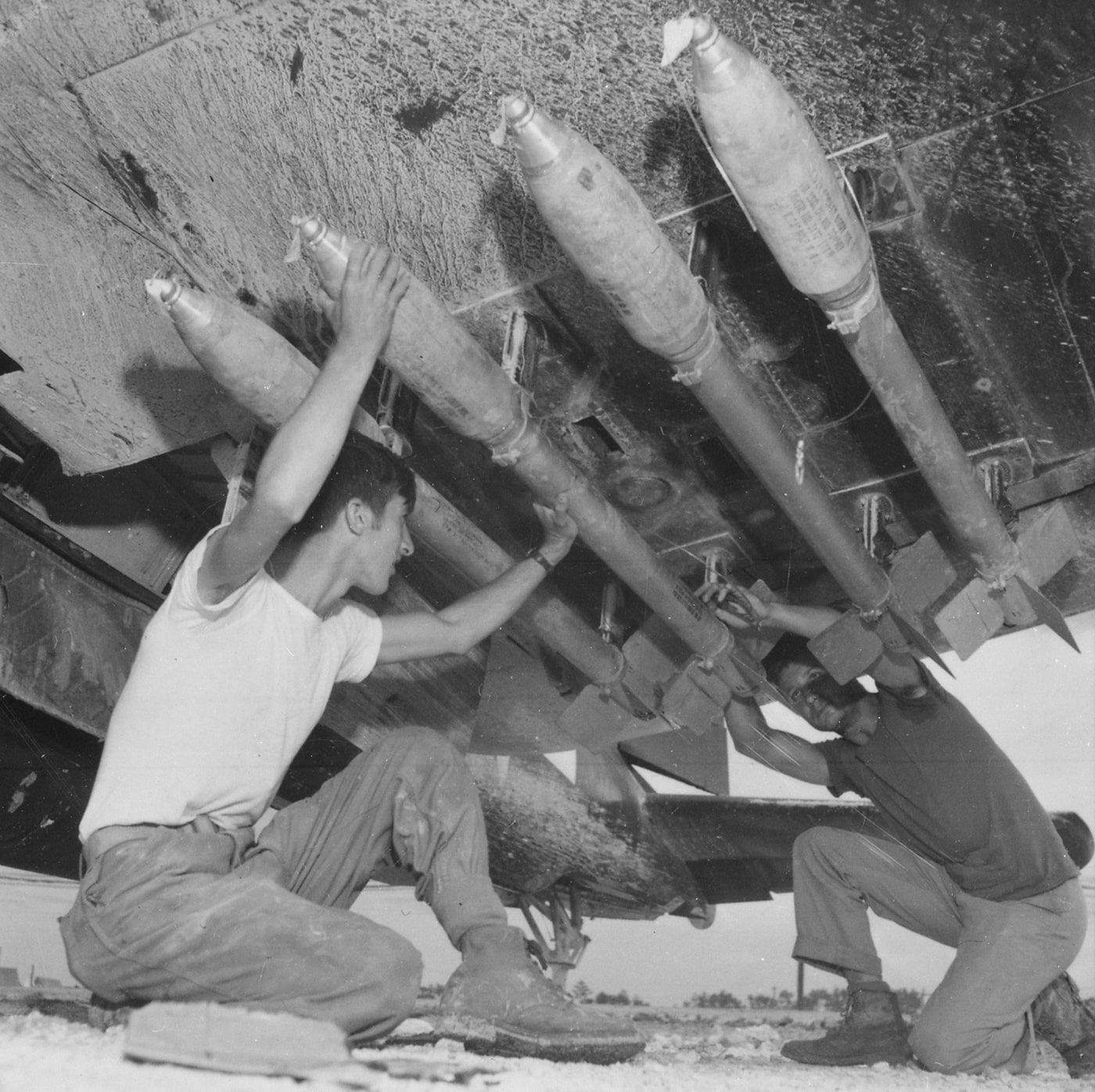 5-inch rockets loaded onto F4U Corsair in Okinawa Japan