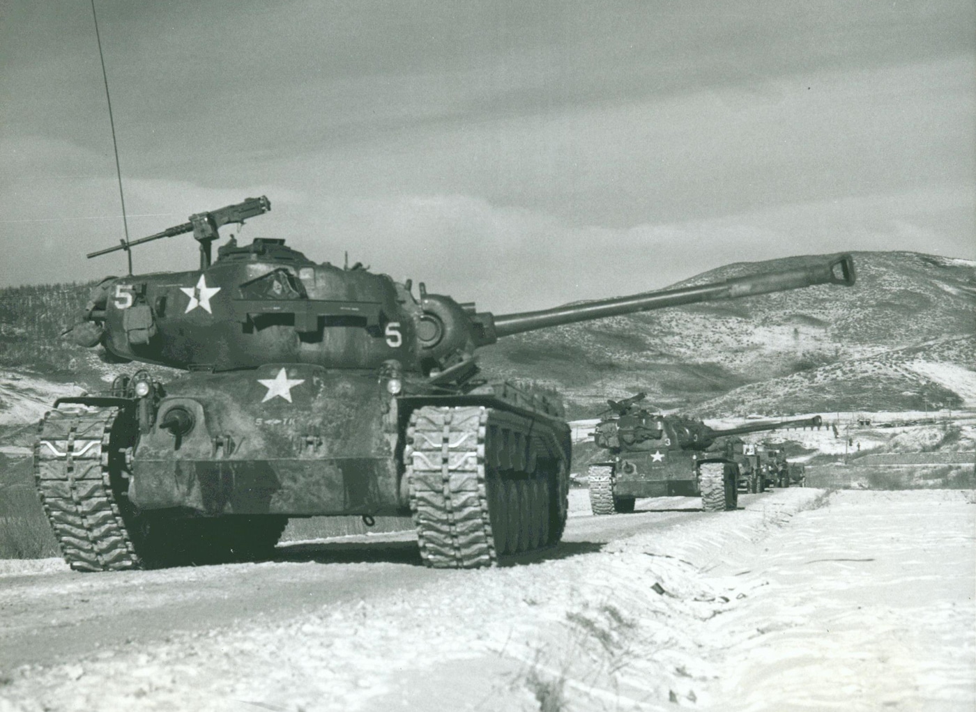 M26 Pershing tanks move down road Hagaru-ri