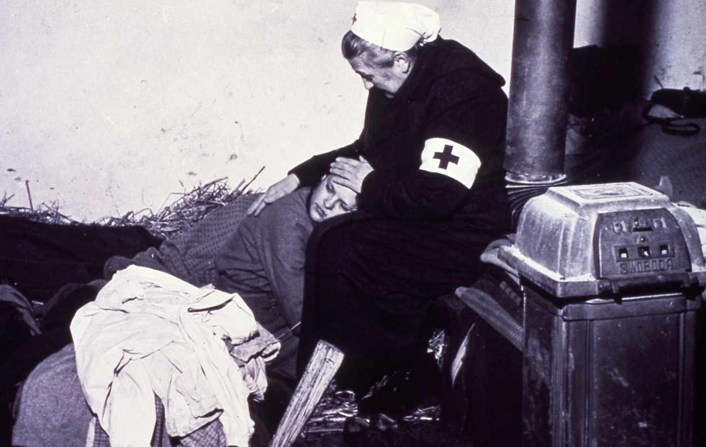 Red Cross worker comforting soldier in WWI