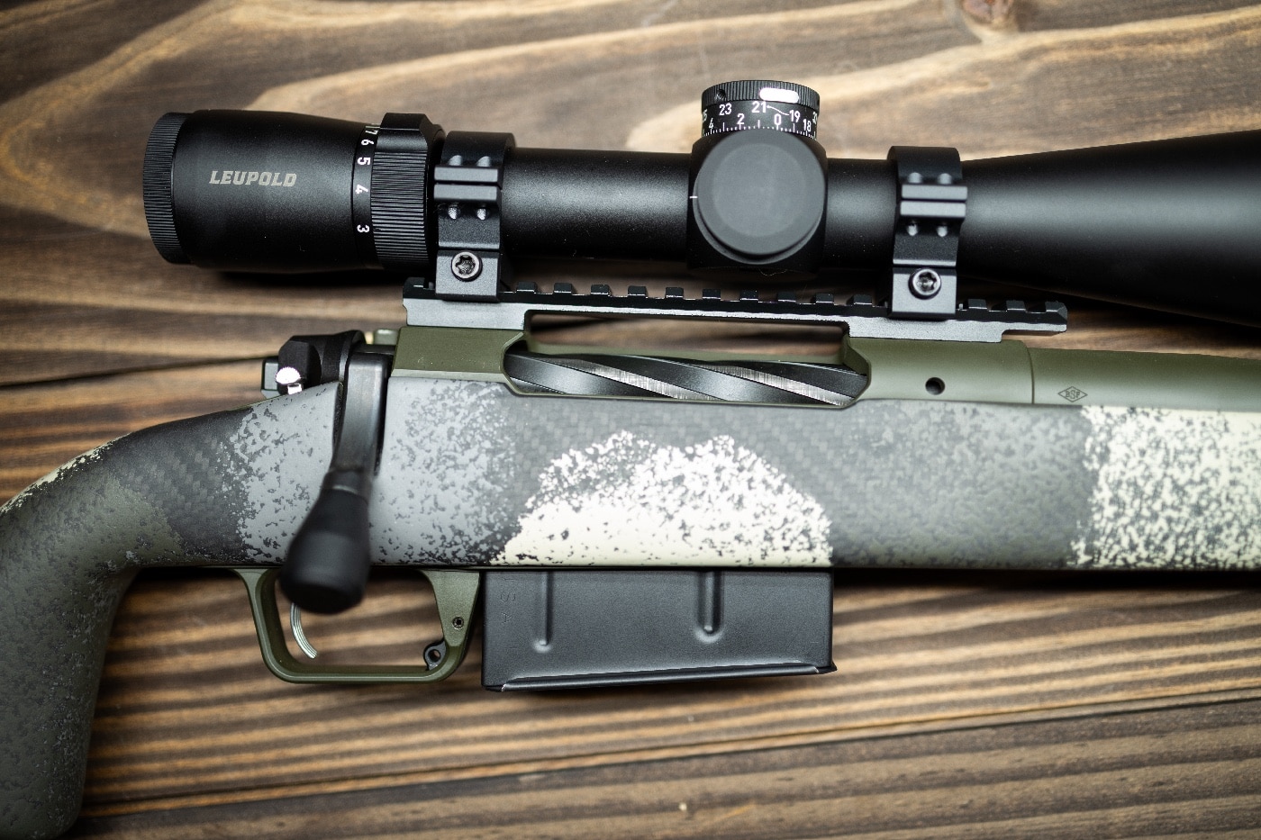In this photo of the Springfield Model 2020 Long Action Waypoint review, we see the fluted bolt and a Leupold variable power rifle scope mounted on a Picatinny rail. The barrel is free floated.