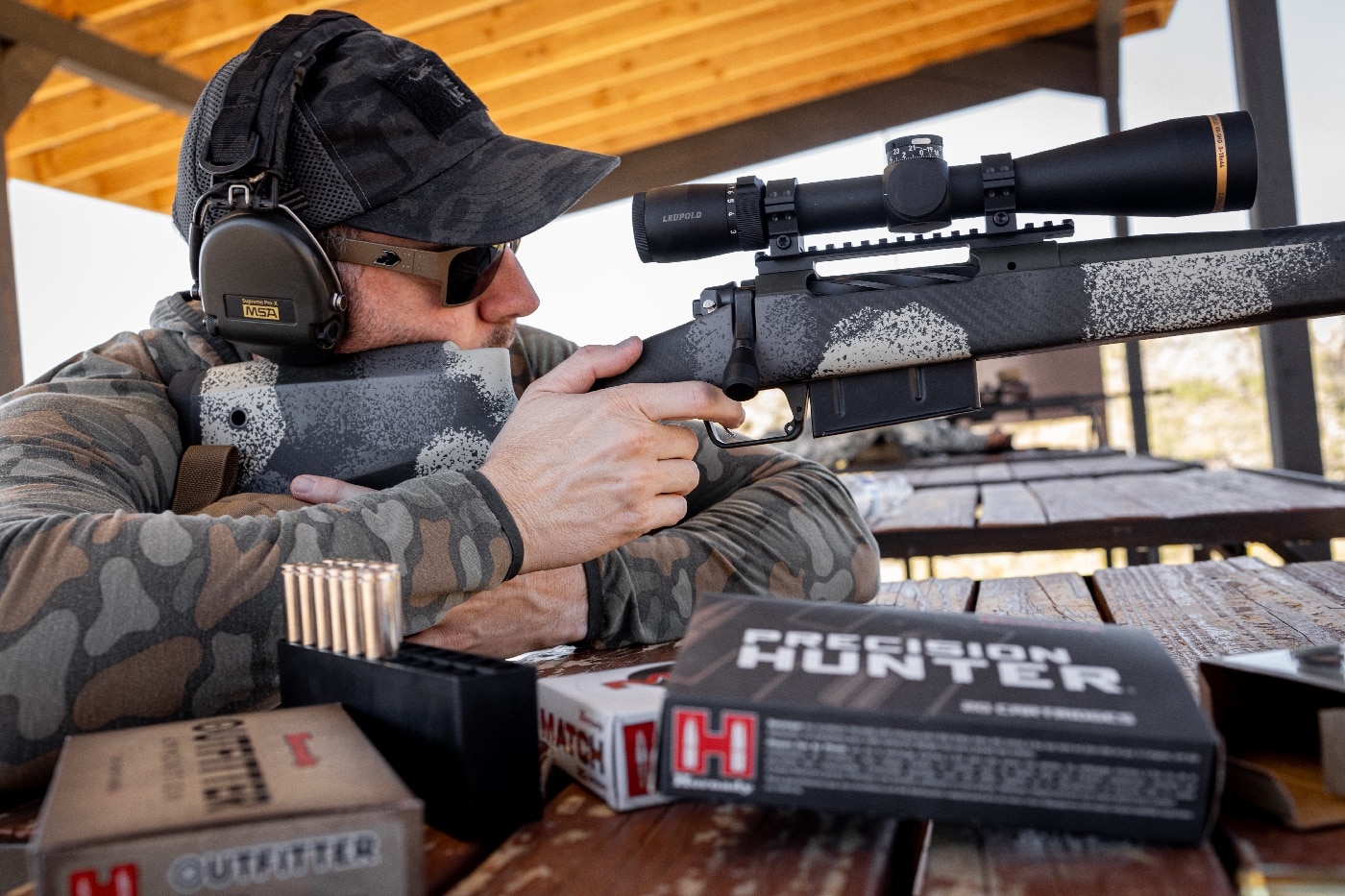 In this photo, we see the author shooting the Model 2020 Long-Action Waypoint on the shooting range. He is testing the precision trigger from TriggerTech. He found it to have a clean pull and release with repeatable results.