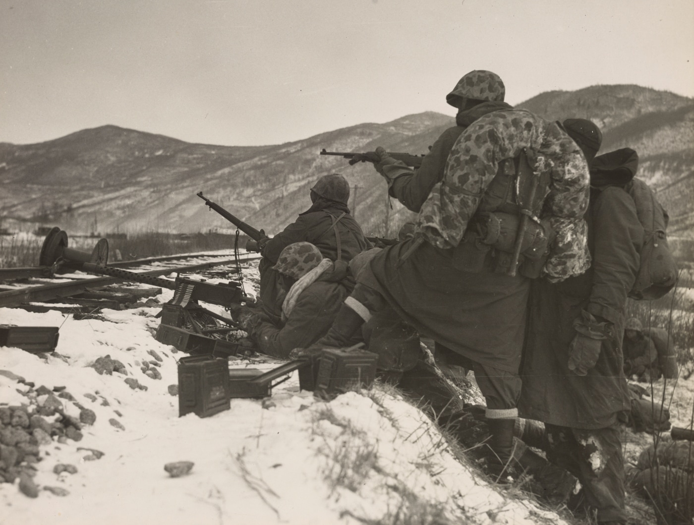 US Marines engage Chinese troops during the Korean War in this photo taken at Chosin Reservoir in North Korea. North Korean forces had been soundly beaten prior to the Chinese invasion that led to the Battle of the Chosin Reservoir.