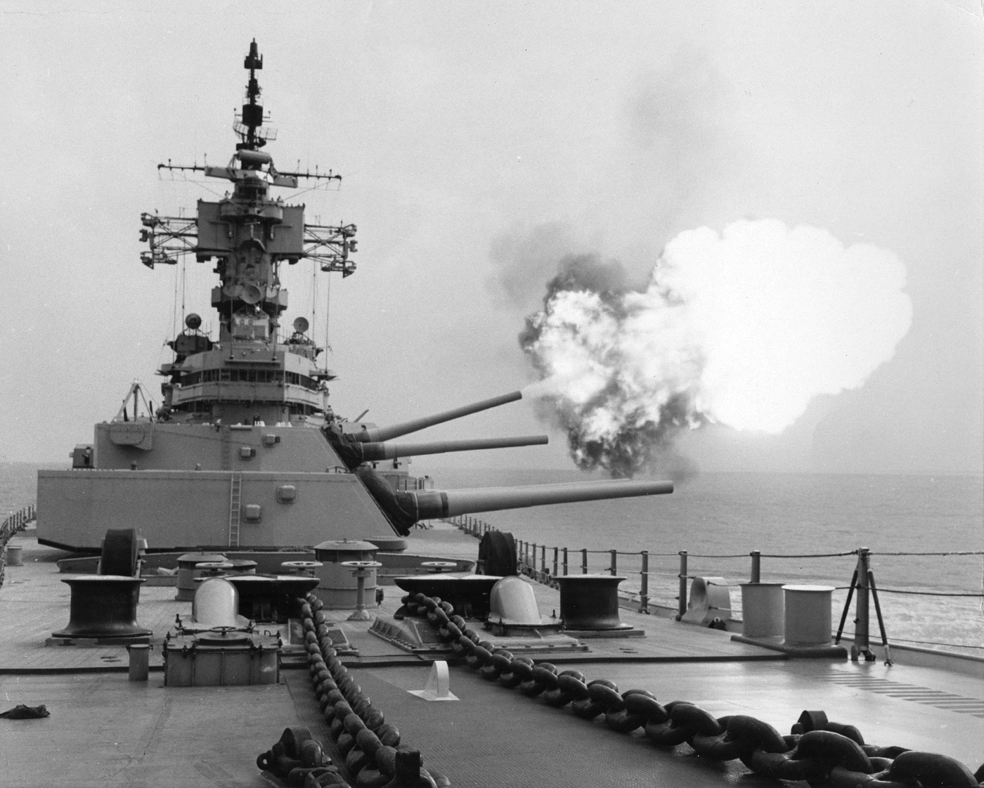 USS New Jersry fires a single 16-inch gun from Turret No.2 in Vietnam