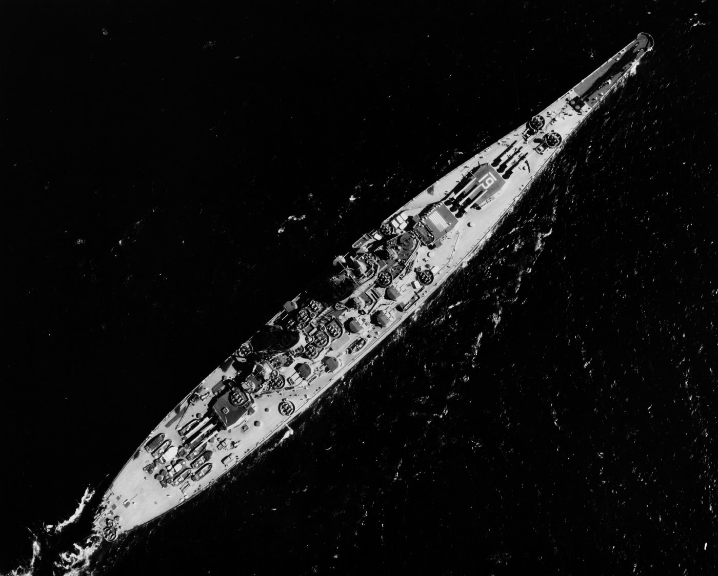 overhead photo of USS Iowa showing armament during Korean War