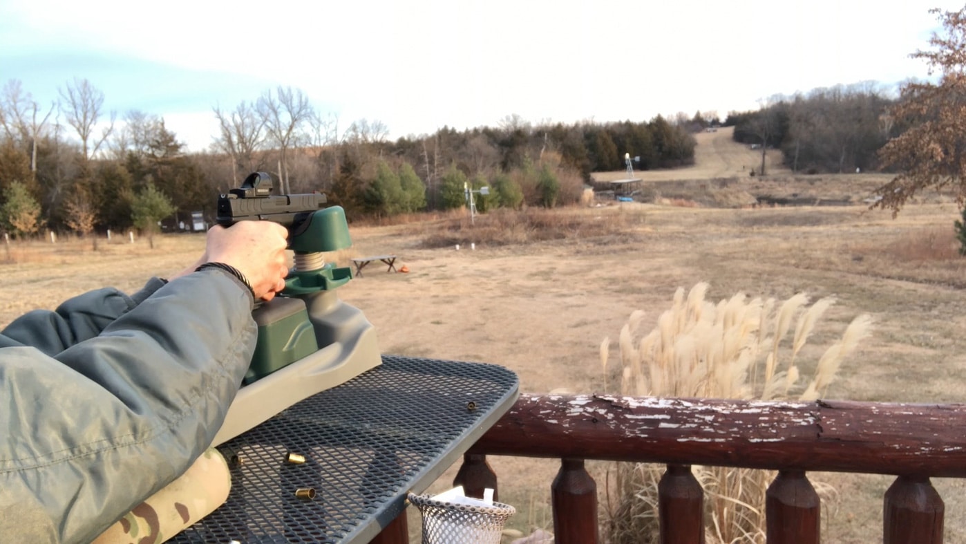 shooting xd-m 10mm Elite with mounted Gideon Omega red dot sight