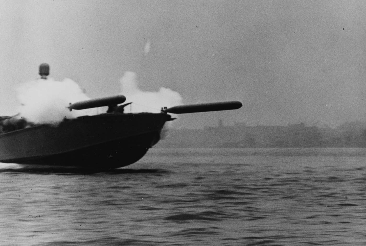 Elco type PT boat fires Type VIII torpedoes near Rhode Island