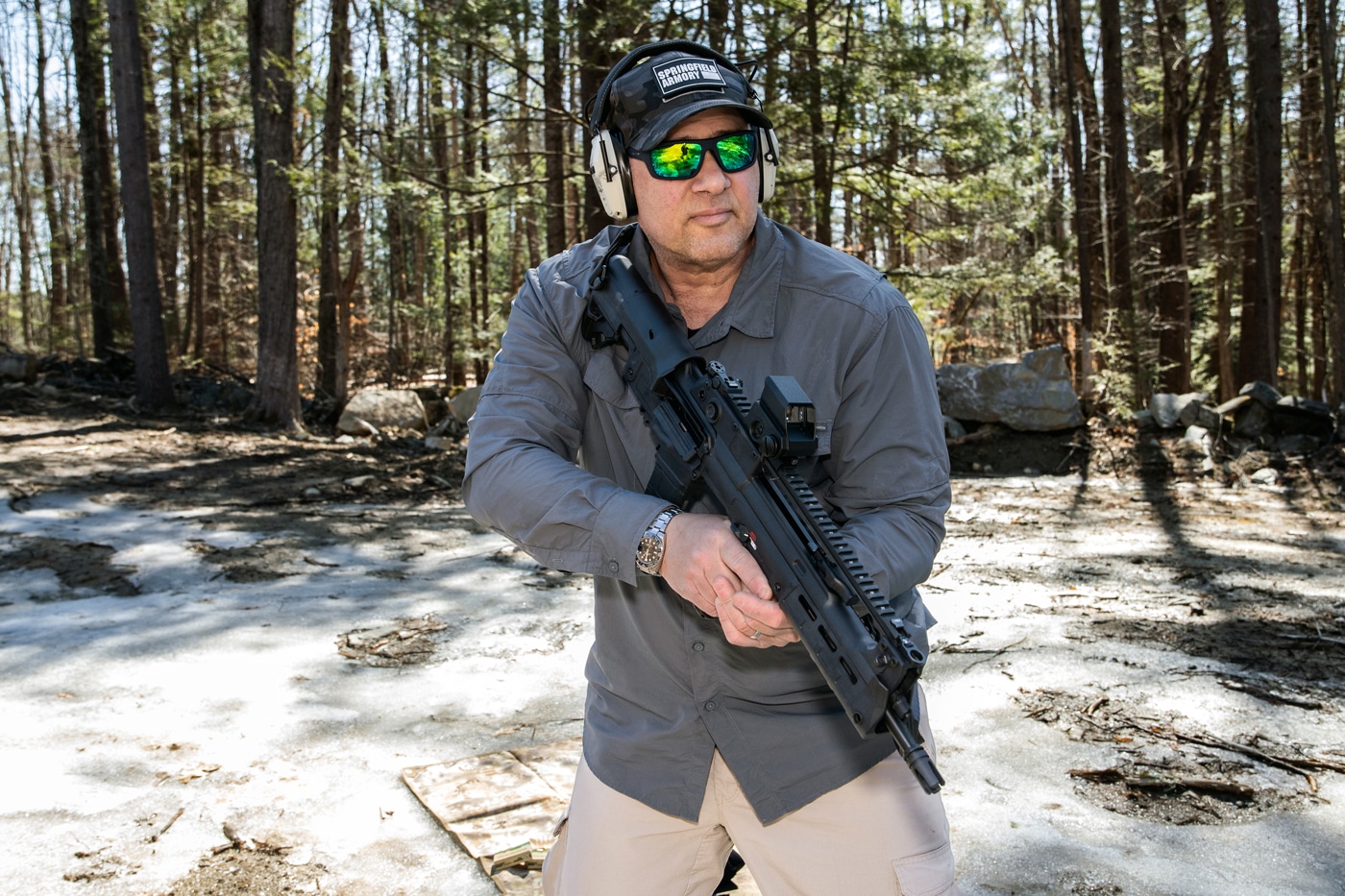 The Meprolight Tru-Vision SR red dot sight shown mounted on a Springfield Hellion rifle. The optic features a large 29x20mm viewing window and compact, durable construction. This Israeli-made reflex sight is designed for fast target acquisition and tactical reliability. The photo highlights the rugged build and Picatinny mount attachment. The SR variant includes a selectable Speed Ring reticle and auto-brightness mode.
