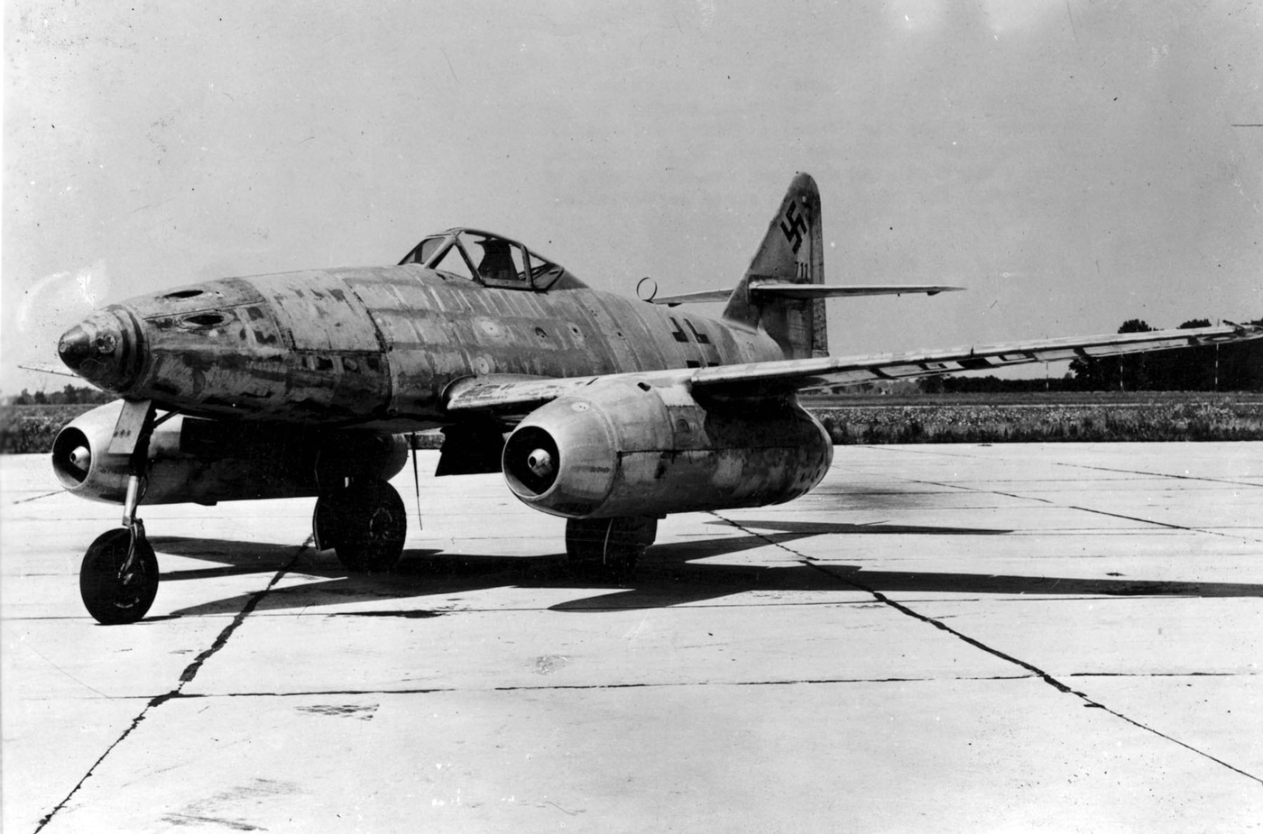 Messerschmitt Me 262 jet fighter on runway of German airport during World War II
