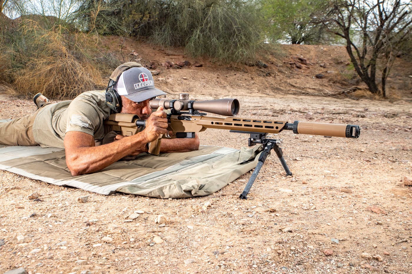 Image showing the author shooting the rifle with the B5 Systems P-Grip 23 on the Model 2020 Heatseeker chassis. The grip has a more vertical angle for better ergonomics in precision shooting. It features aggressive texturing for a secure hold even with gloves. This type of grip geometry is common in bolt-action chassis builds. The grip worked well during testing for this Springfield Armory Model 2020 Heatseeker review.