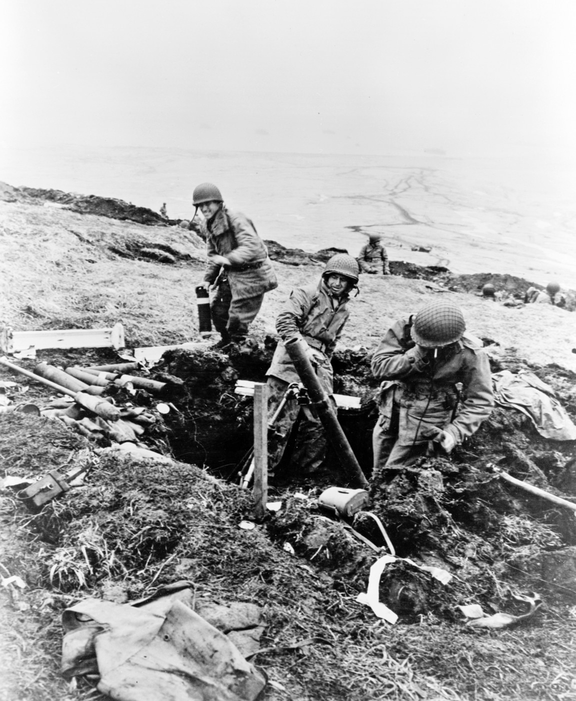 soldiers fire mortar on Attu during the Aleutian Islands campaign