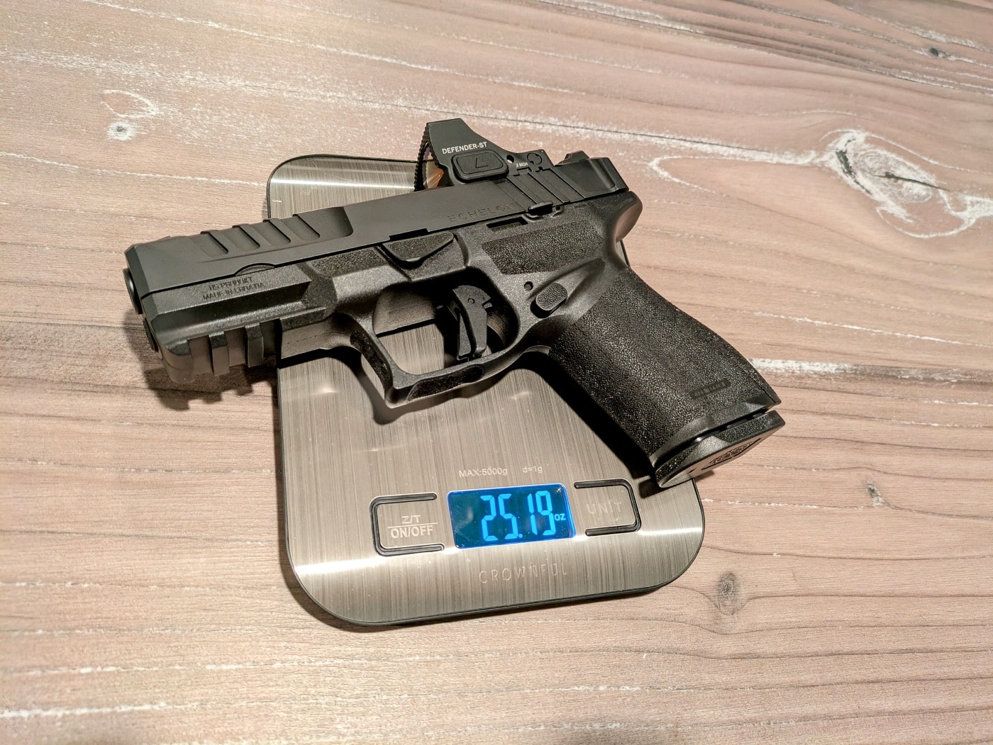 weight of pistols