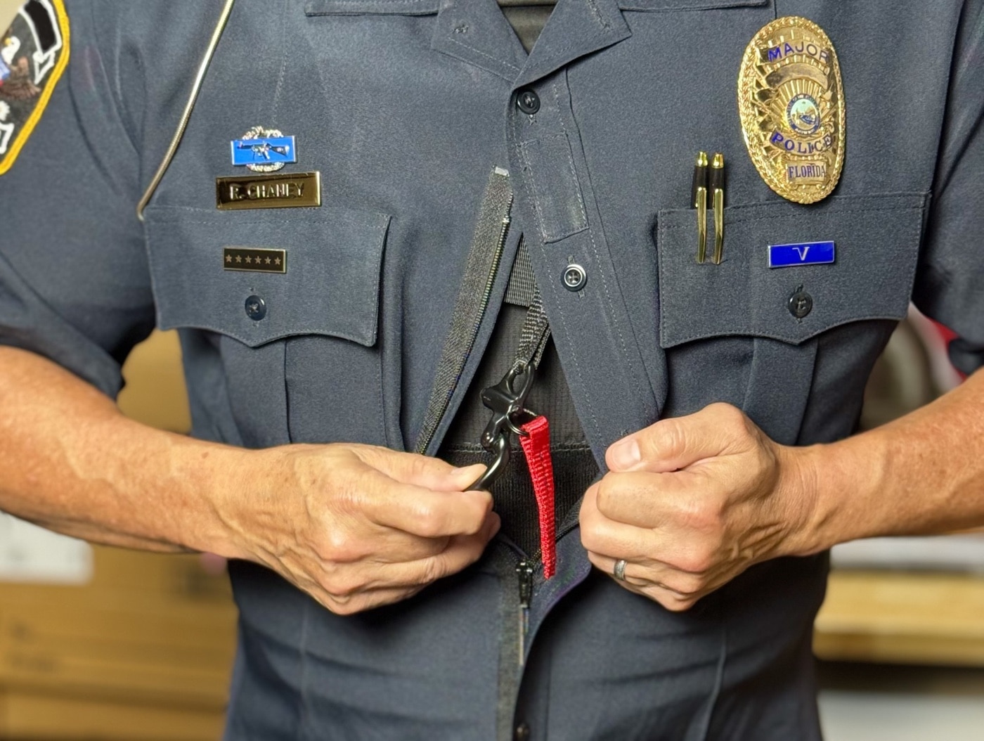 Chalker Sling shackle under a uniform shirt