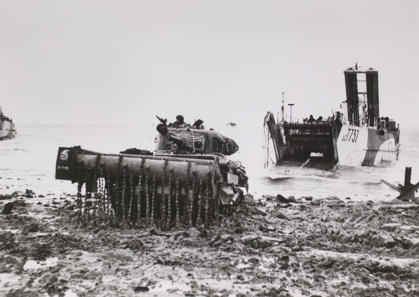 Churchill flail tank exiting landing craft at Westkapelle