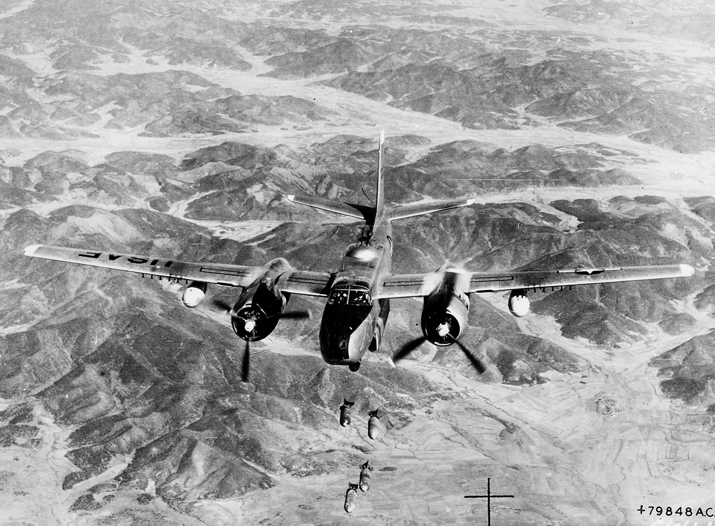 Douglas B-26 Invader drops bombs on North Korean target