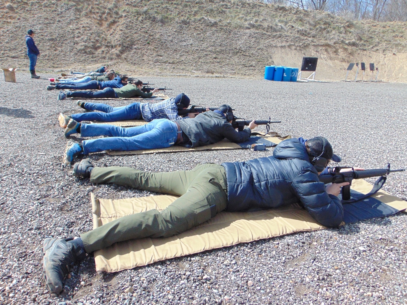 Hillsdale College rifle class shooters at 25 yard line shooting range