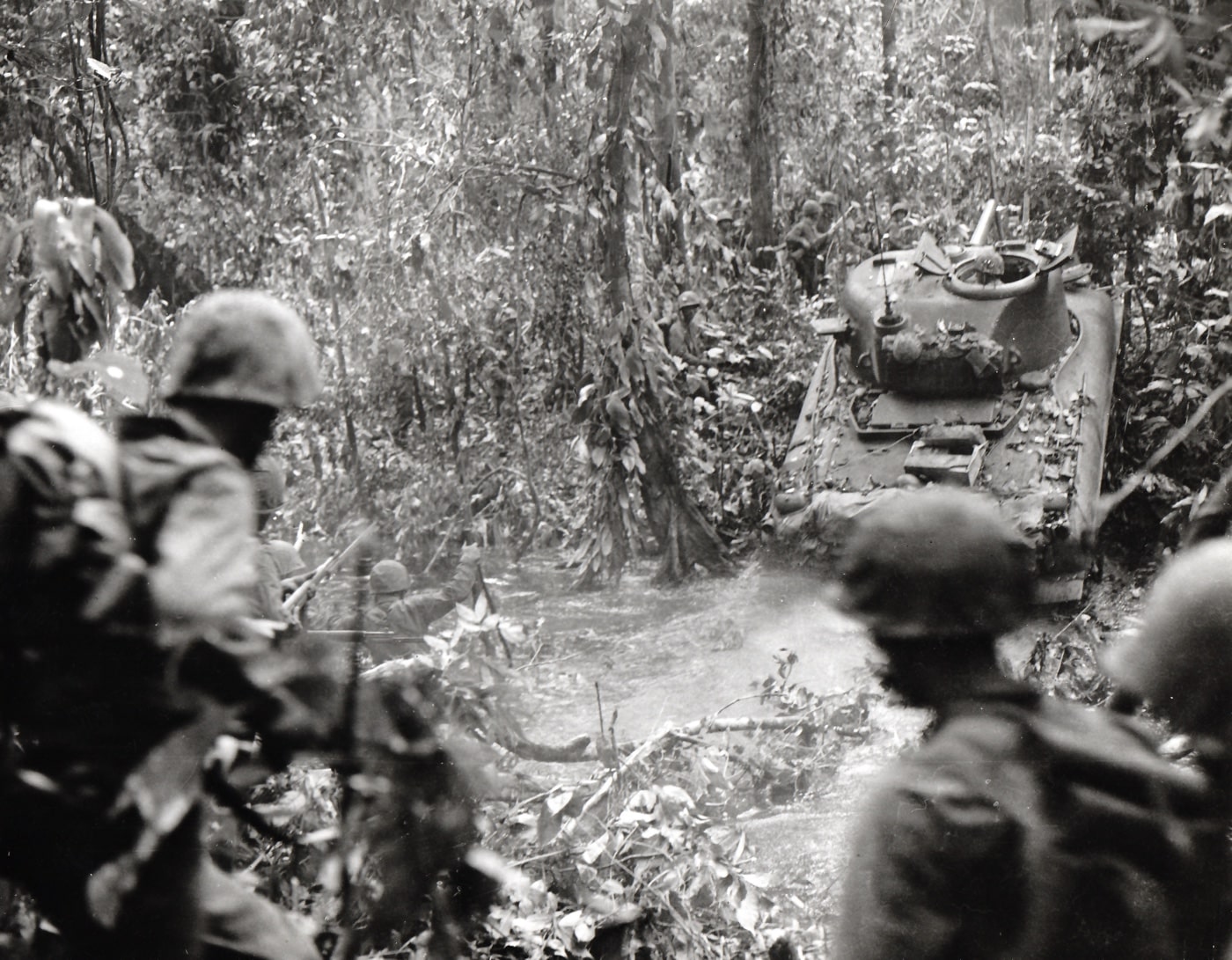M4 Sherman tank fords a jungle river during Battle of Cape Gloucester