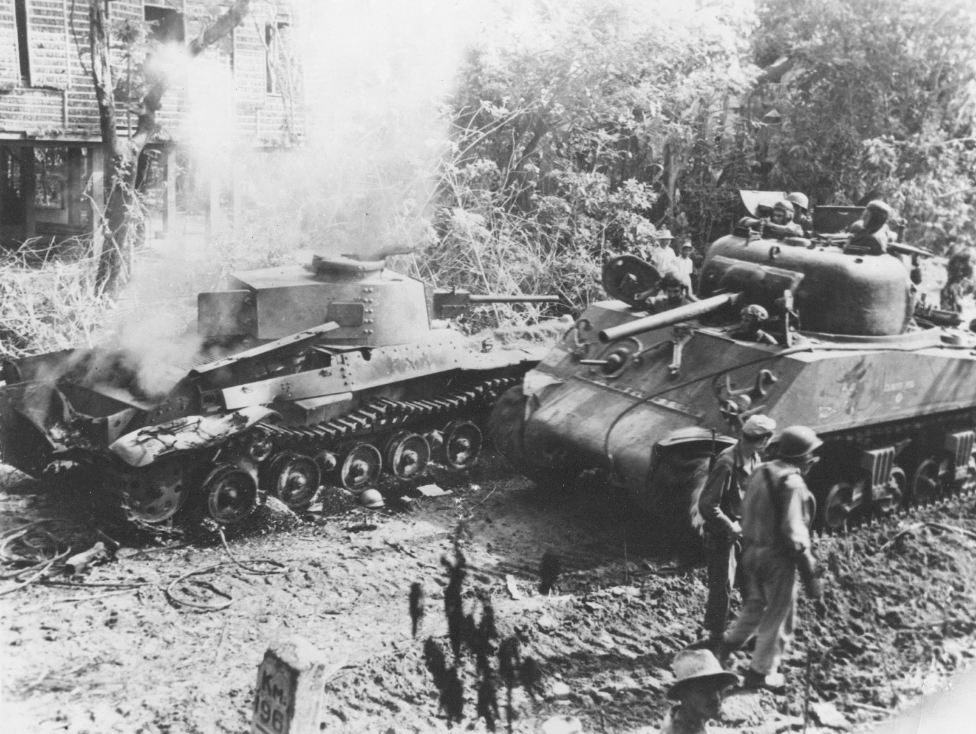 Sherman tank defeats Japanese Type 97 Shinhoto Chi-Ha tank in the Philippines