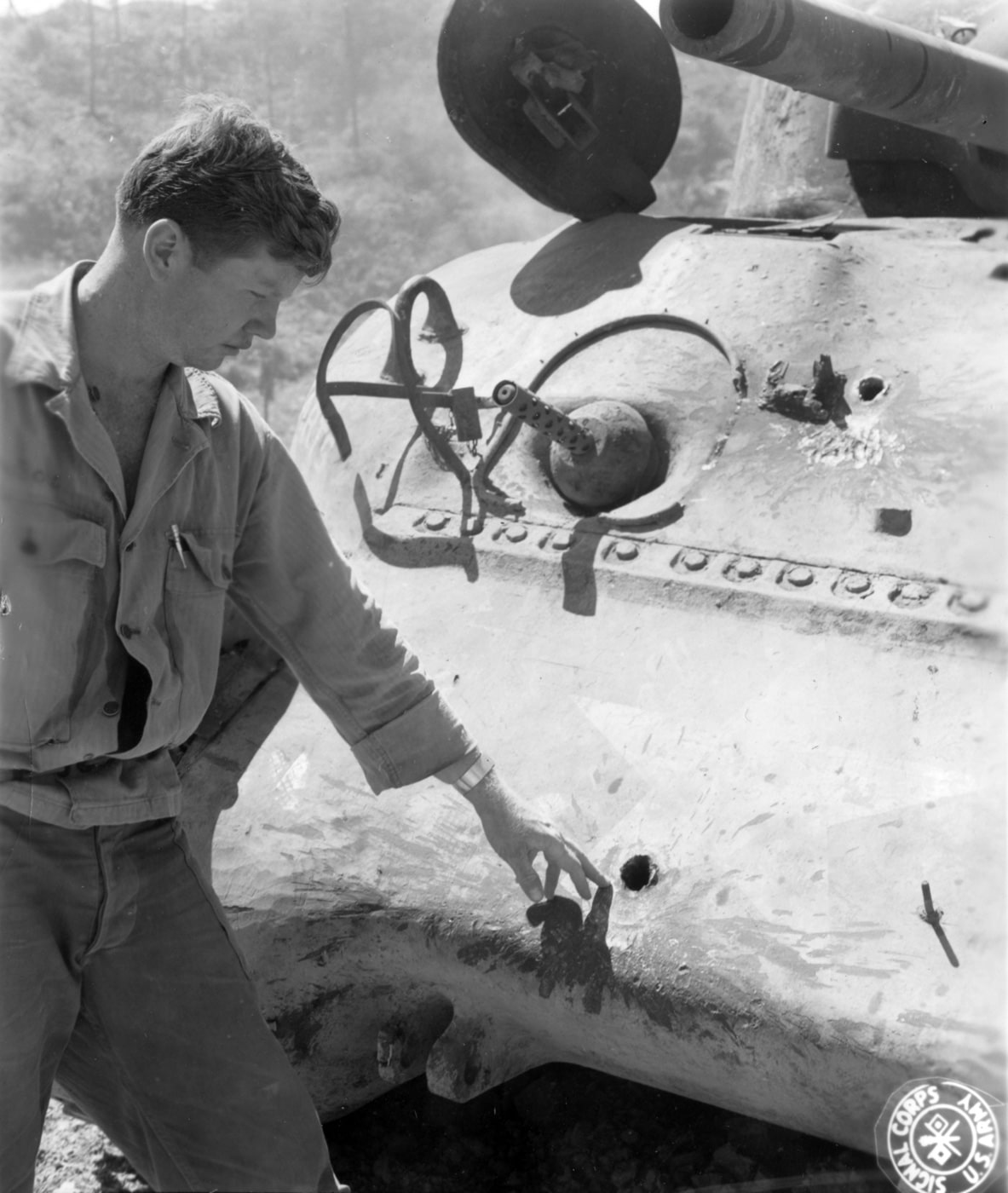 Sherman tank hit by a Japanese Type 1 47mm anti tank gun